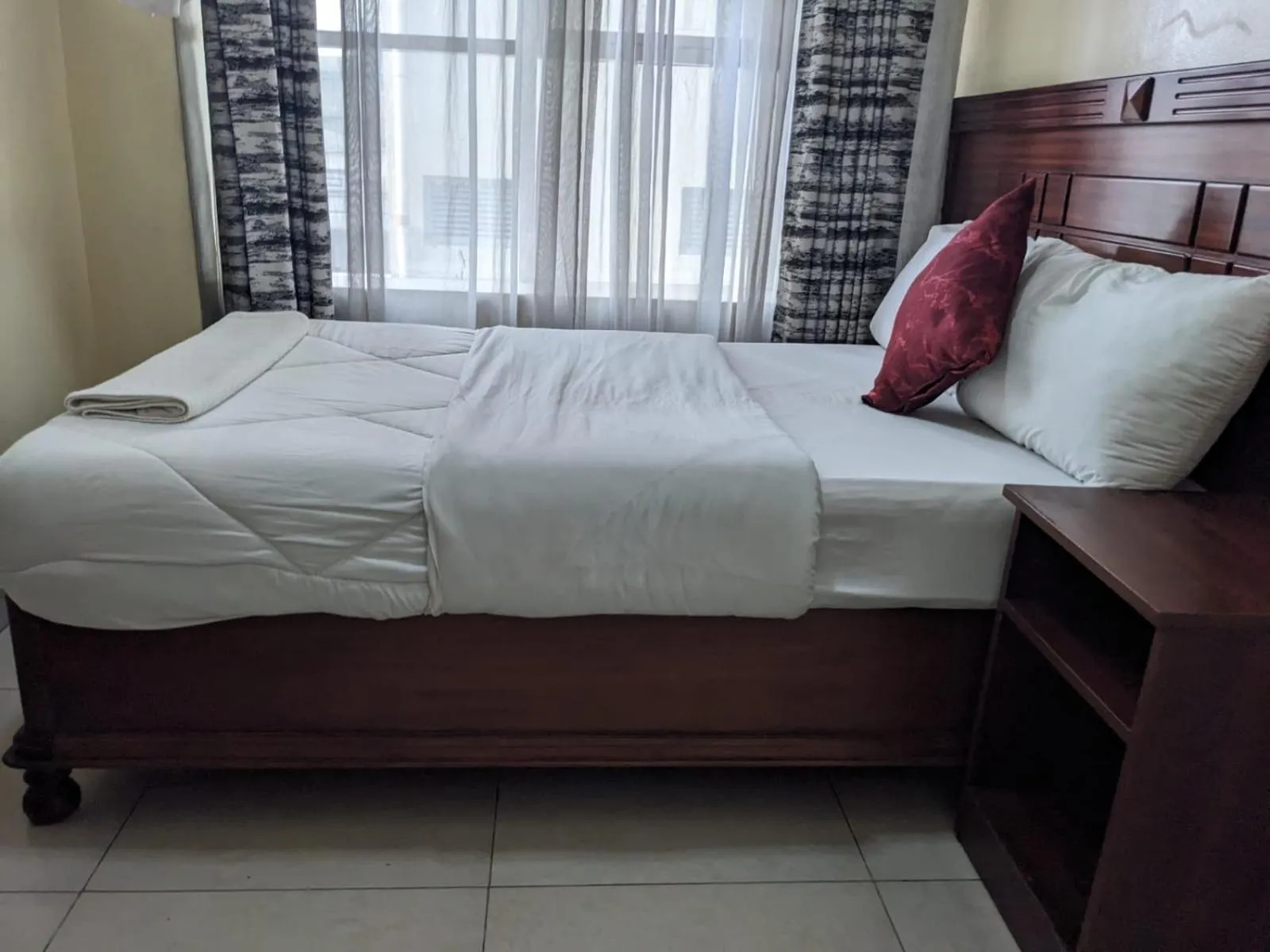 Bed in Epitome Times Hotel