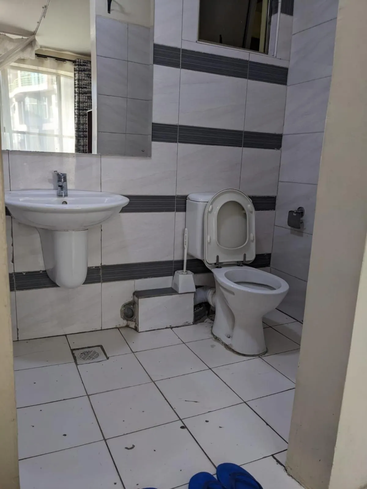 Toilet in Epitome Times Hotel