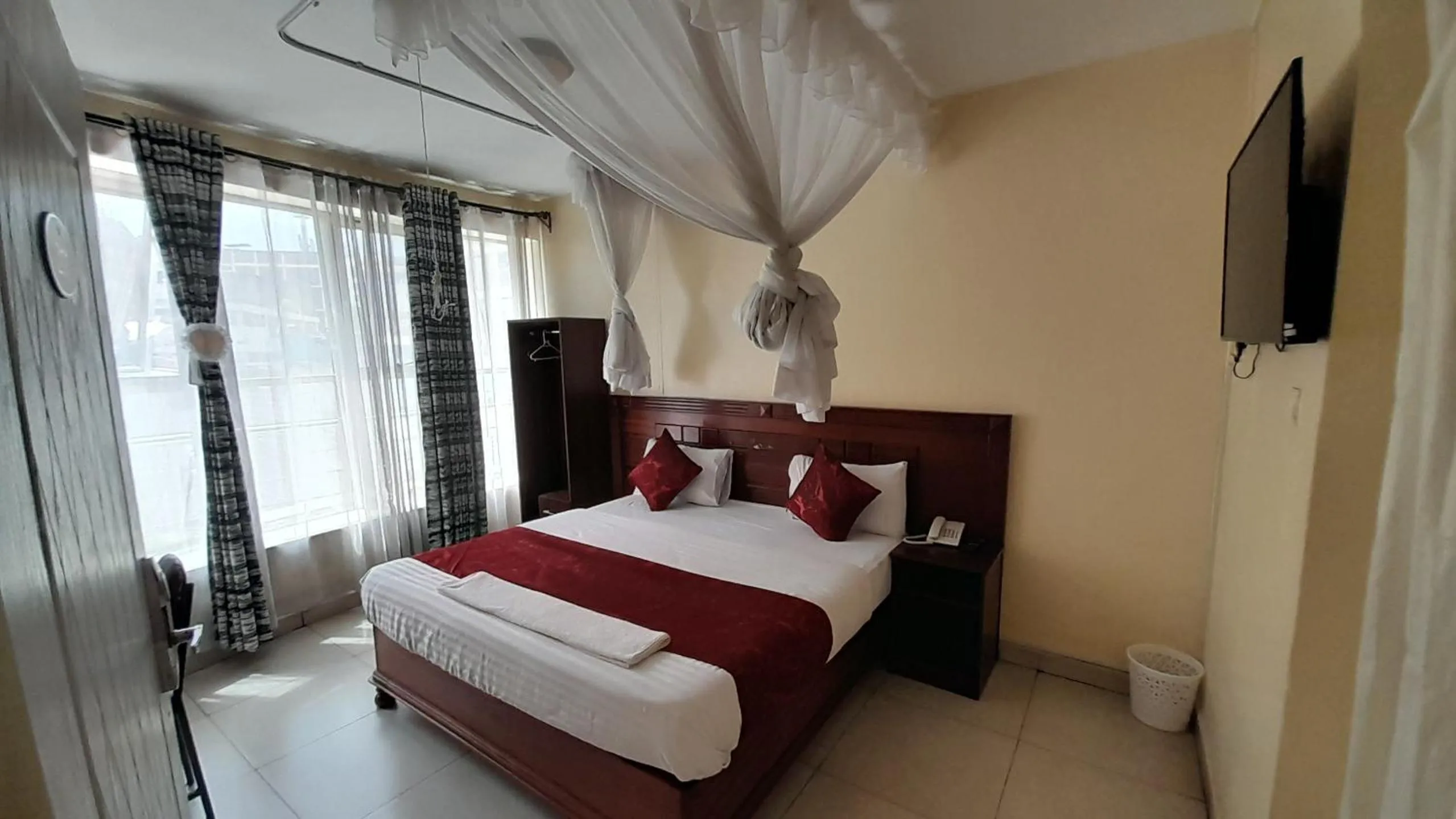 Bed in Epitome Times Hotel