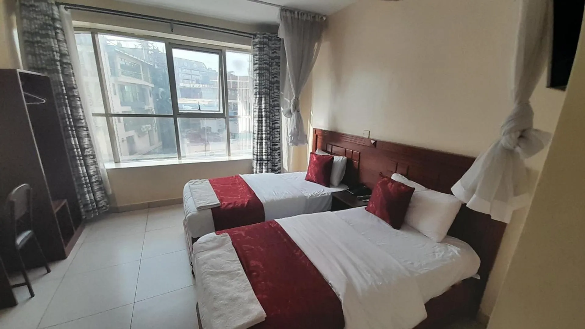 Bed in Epitome Times Hotel