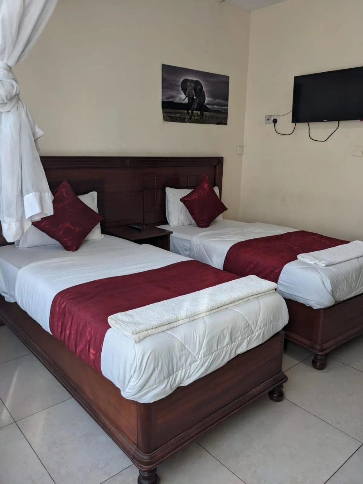 Bed in Epitome Times Hotel