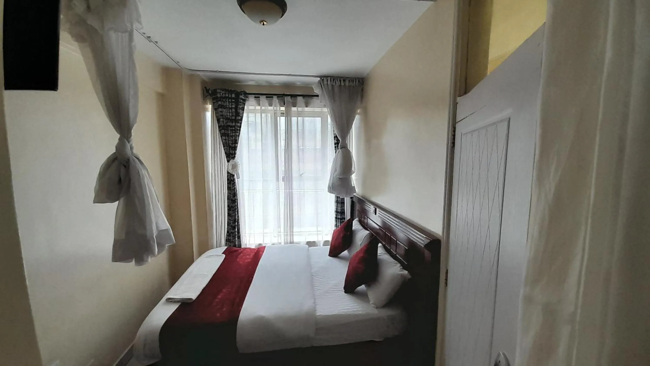 Bed in Epitome Times Hotel