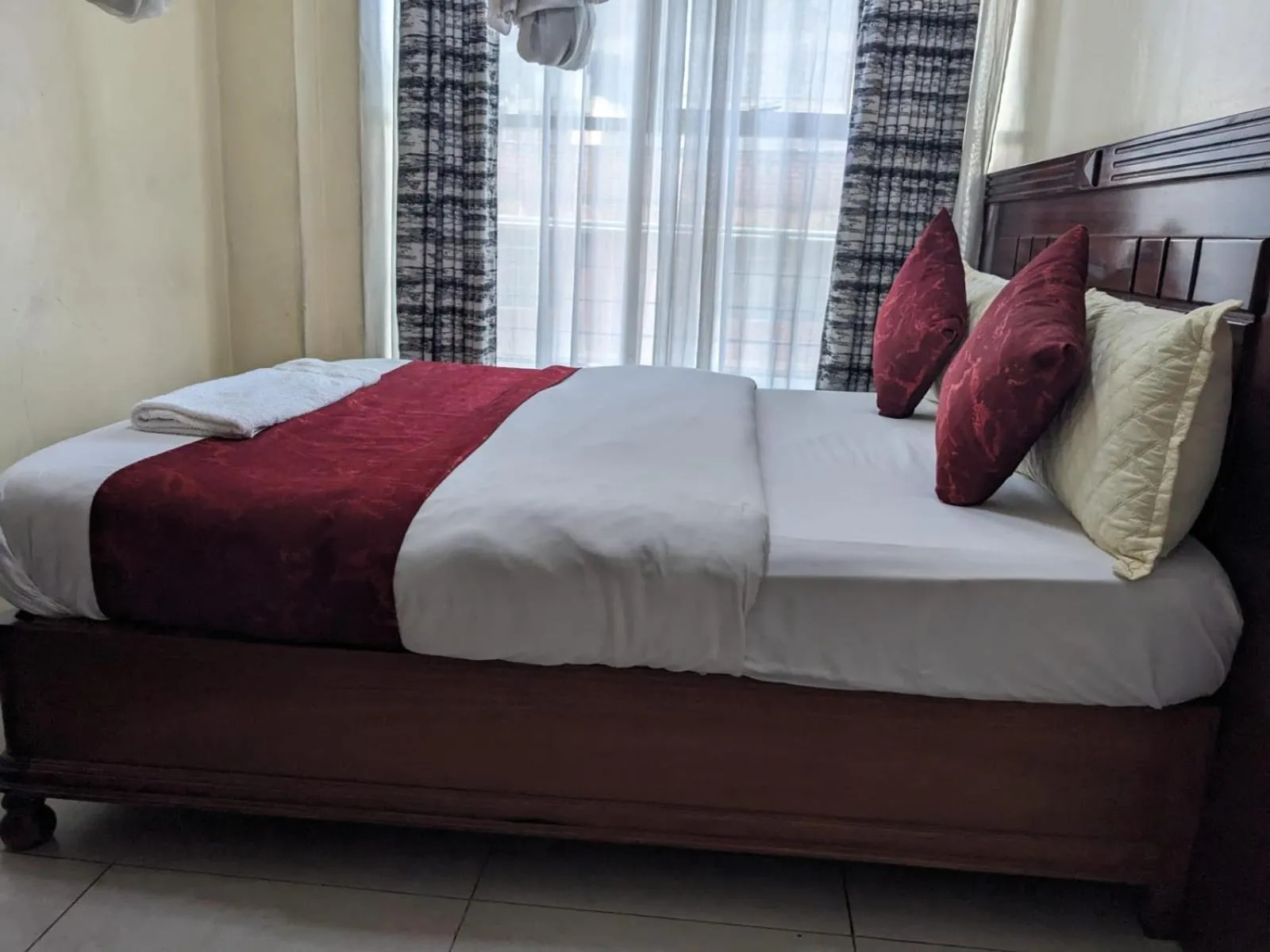 Bed in Epitome Times Hotel