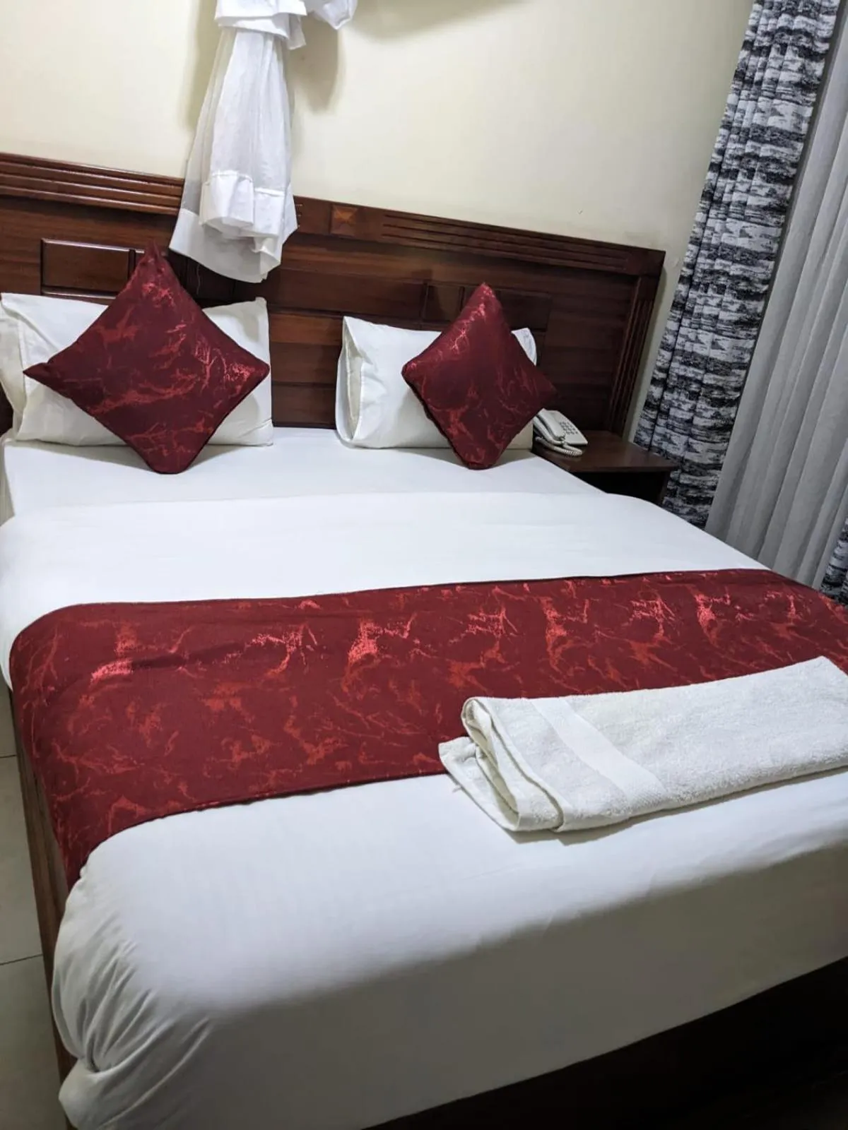 Bed in Epitome Times Hotel