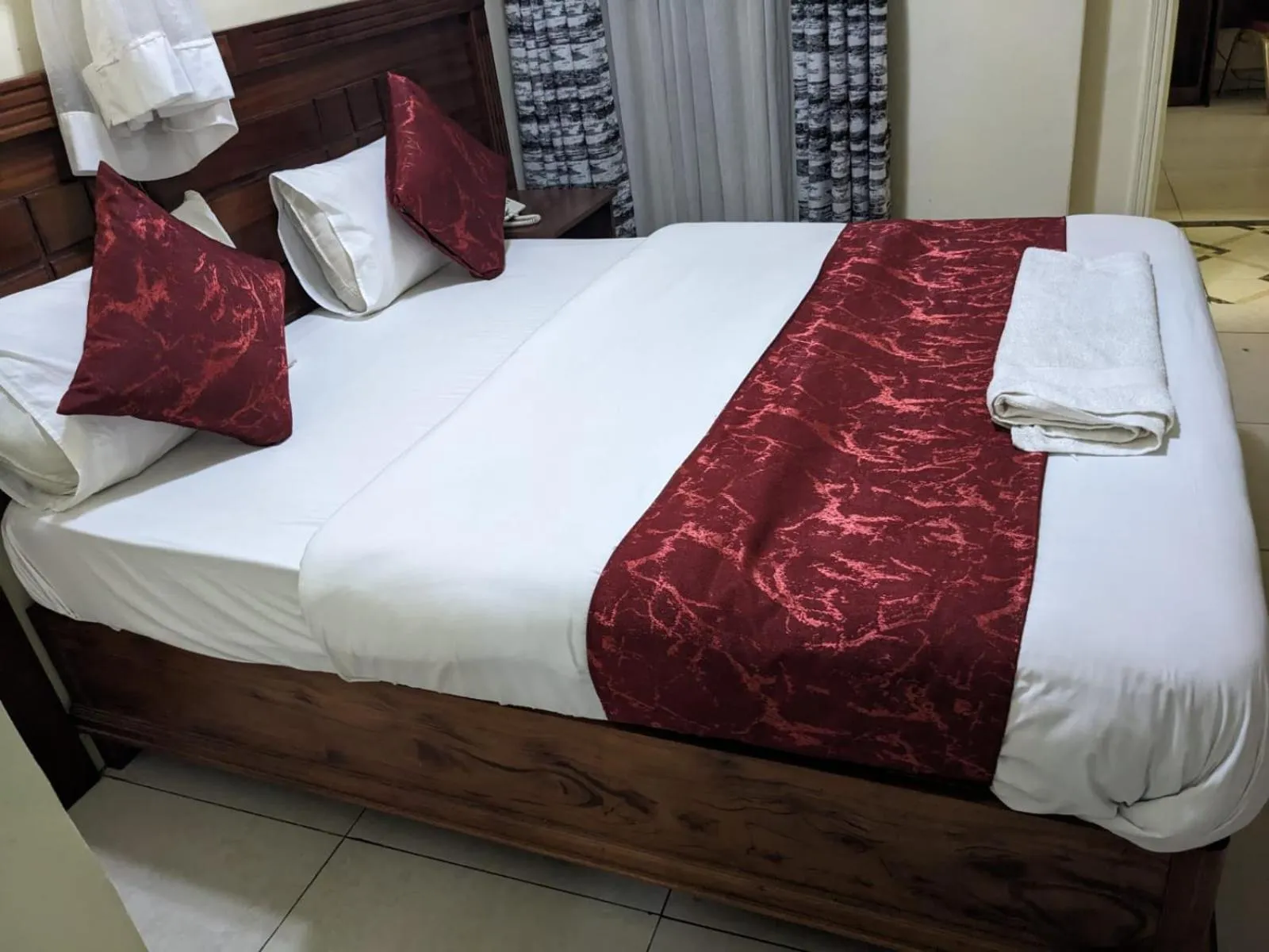 Bed in Epitome Times Hotel