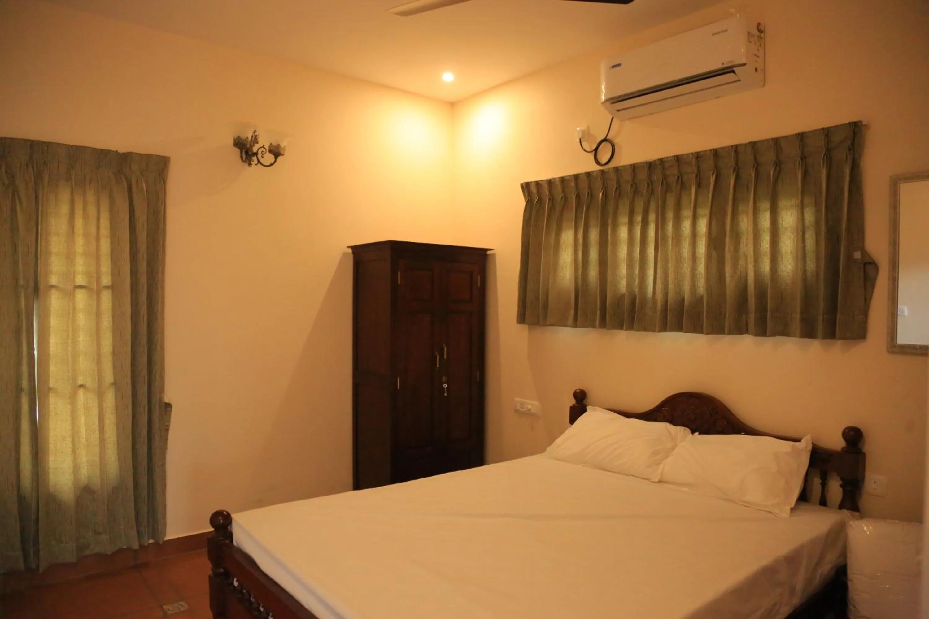 Bed in Ponni Homestay Kumbakonam