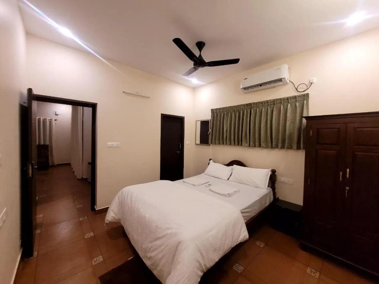 Bed in Ponni Homestay Kumbakonam