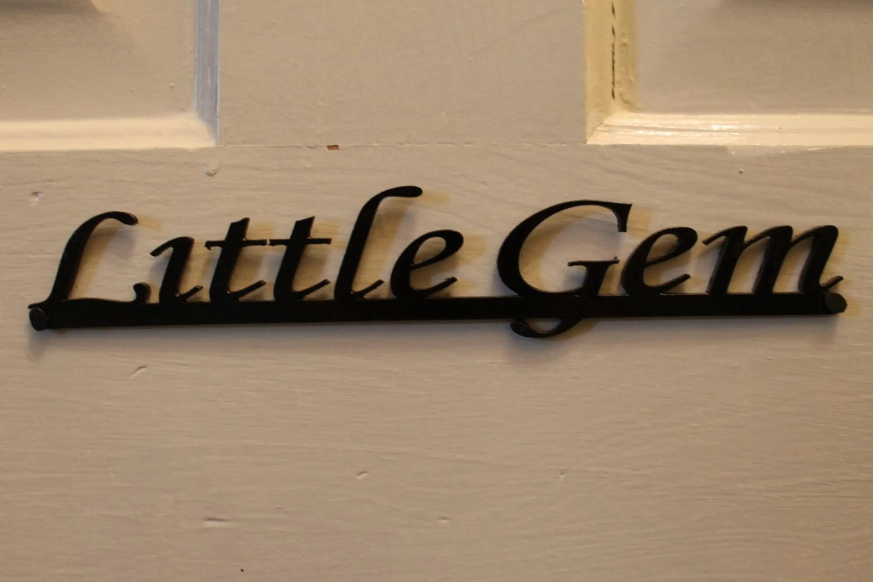 Property logo or sign in Grand Magnolia Ballroom & Suites