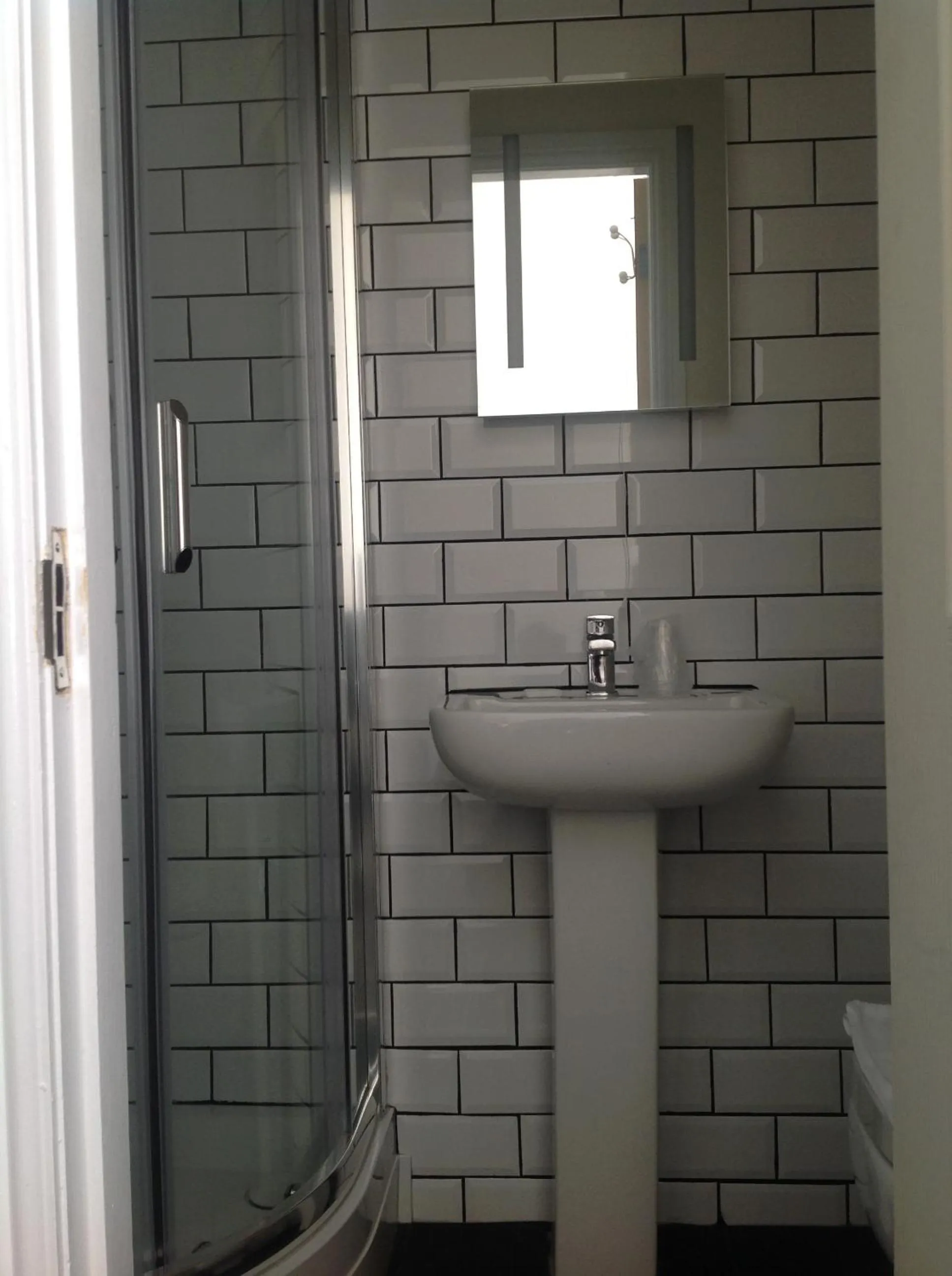 Bathroom in Happy Return Hotel