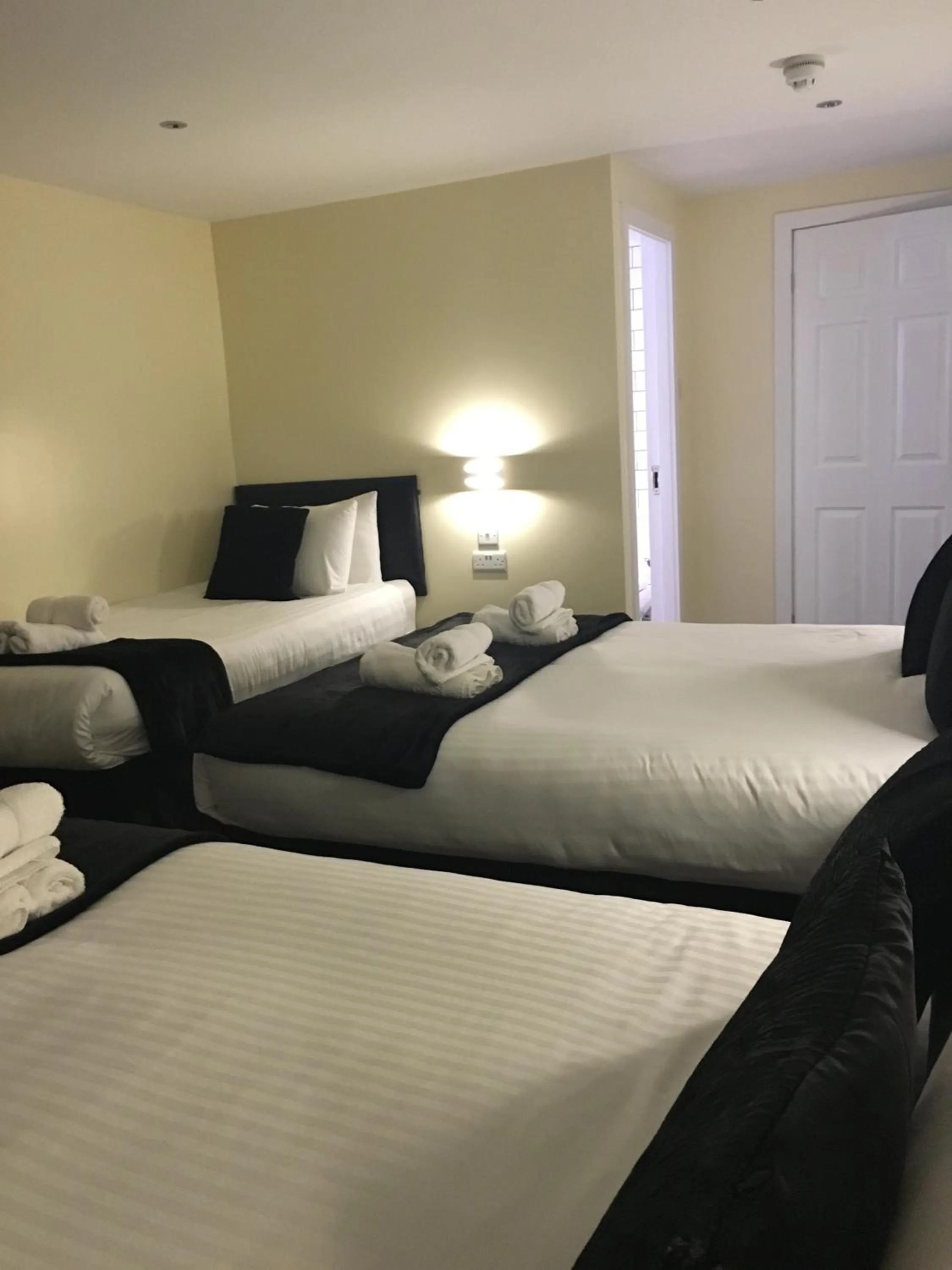 Bed in Happy Return Hotel