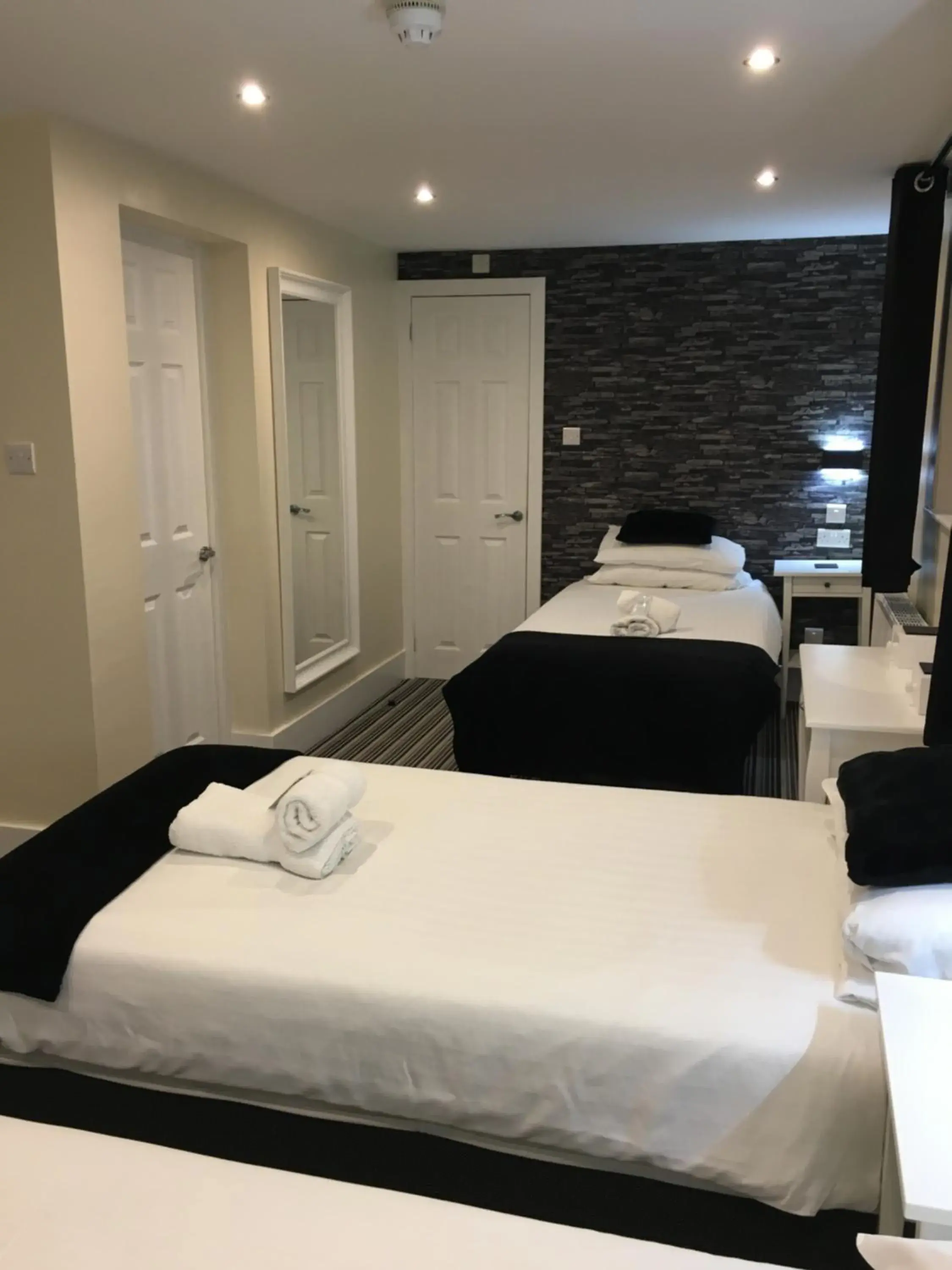 Quadruple Room in Happy Return Hotel Quadruple Room in Happy Return Hotel