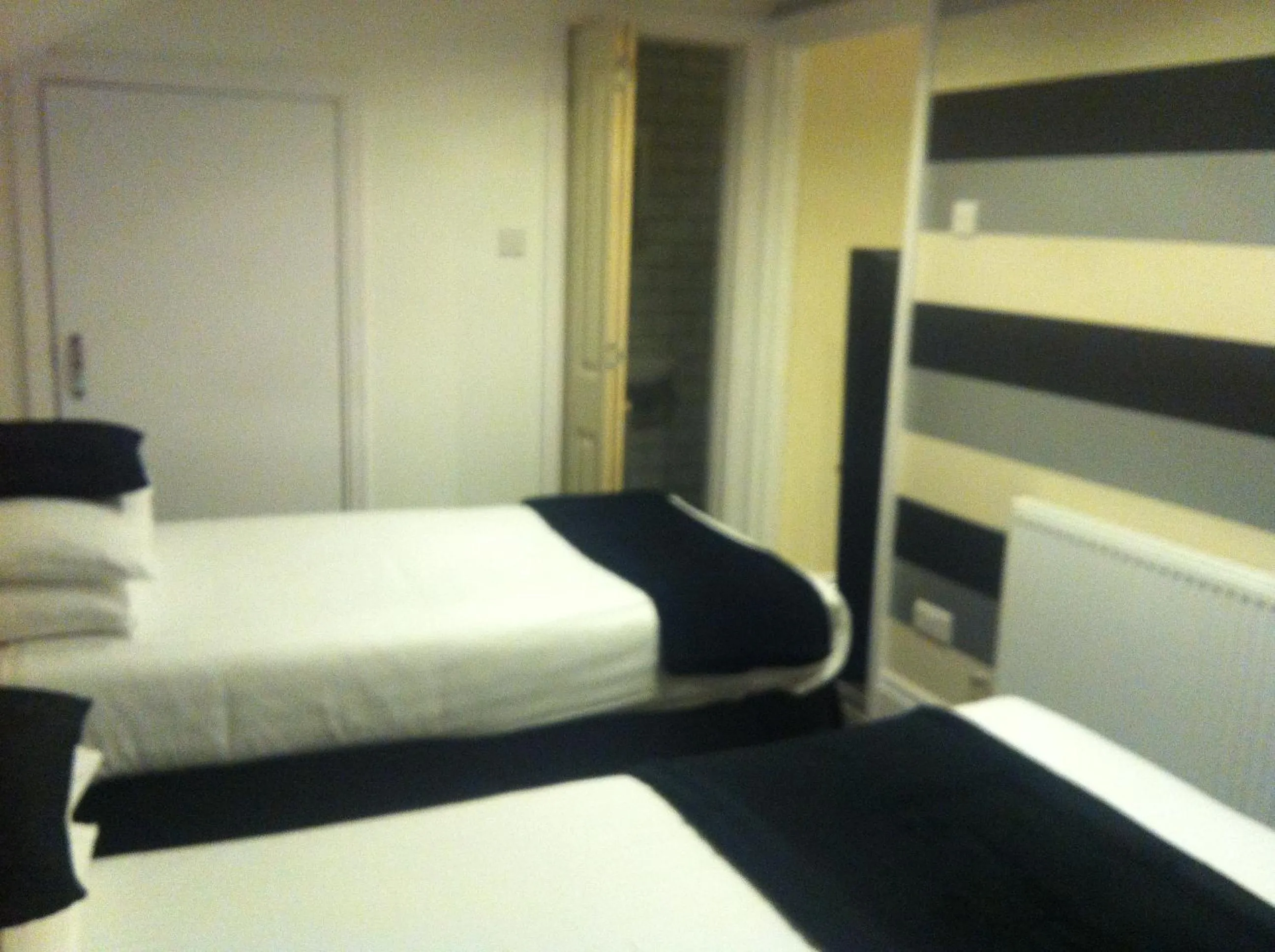 Photo of the whole room, Bed in Happy Return Hotel