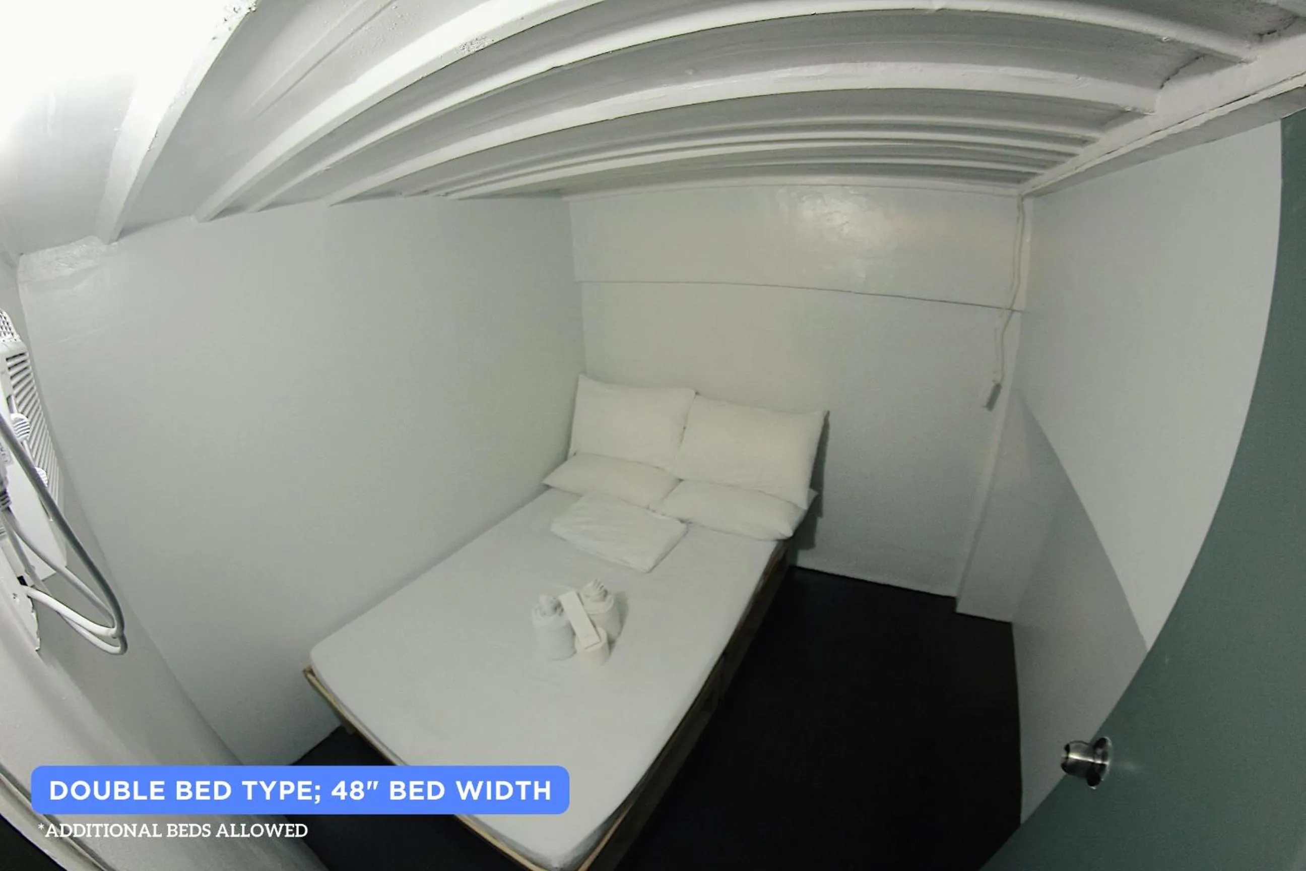 Bed in Dickem's Transient House