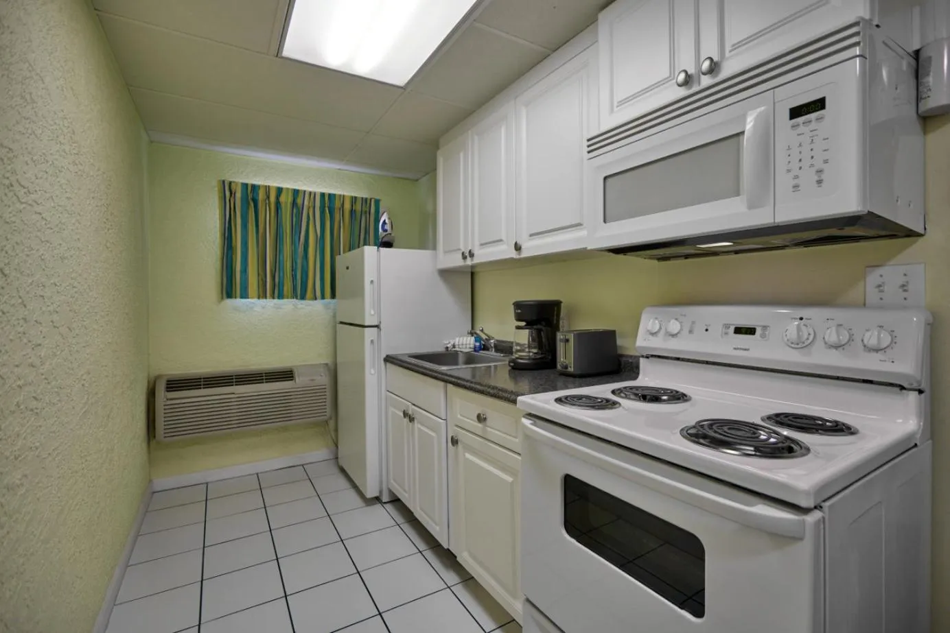 Kitchen or kitchenette in Palmetto Beachfront Hotel, a By The Sea Resort