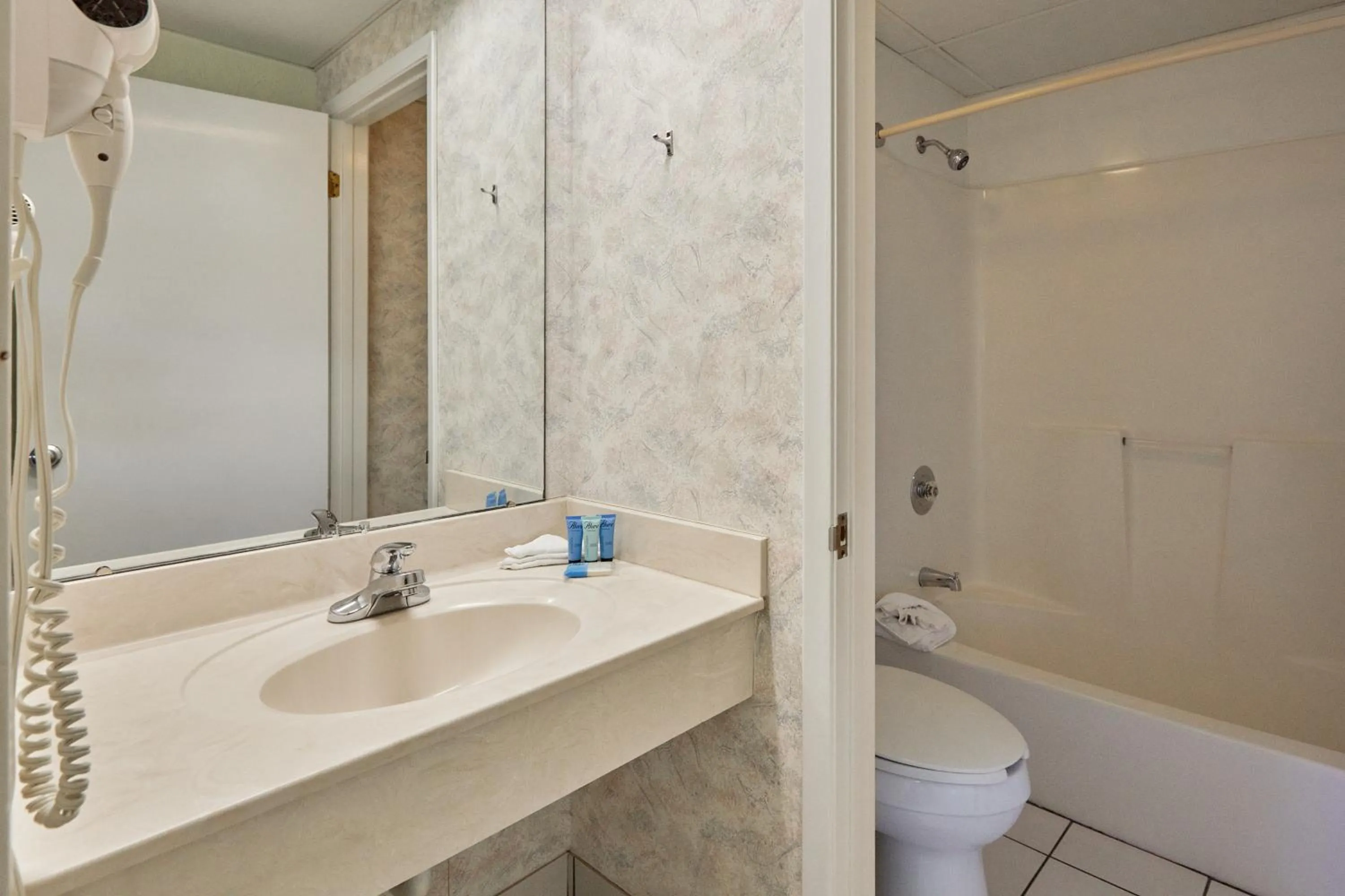 Bathroom in Palmetto Beachfront Hotel, a By The Sea Resort