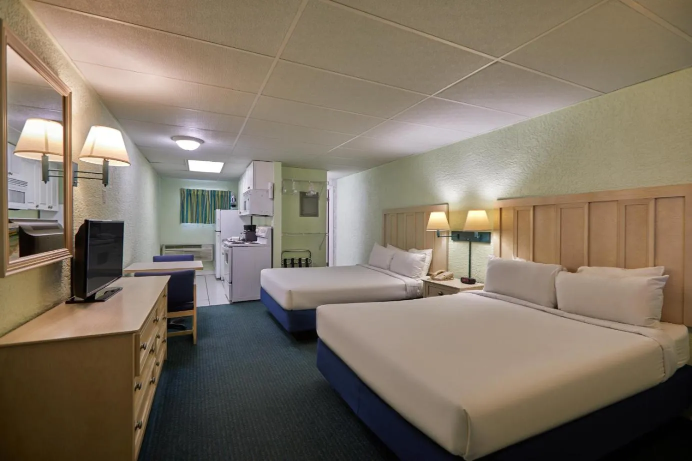 Bed in Palmetto Beachfront Hotel, a By The Sea Resort