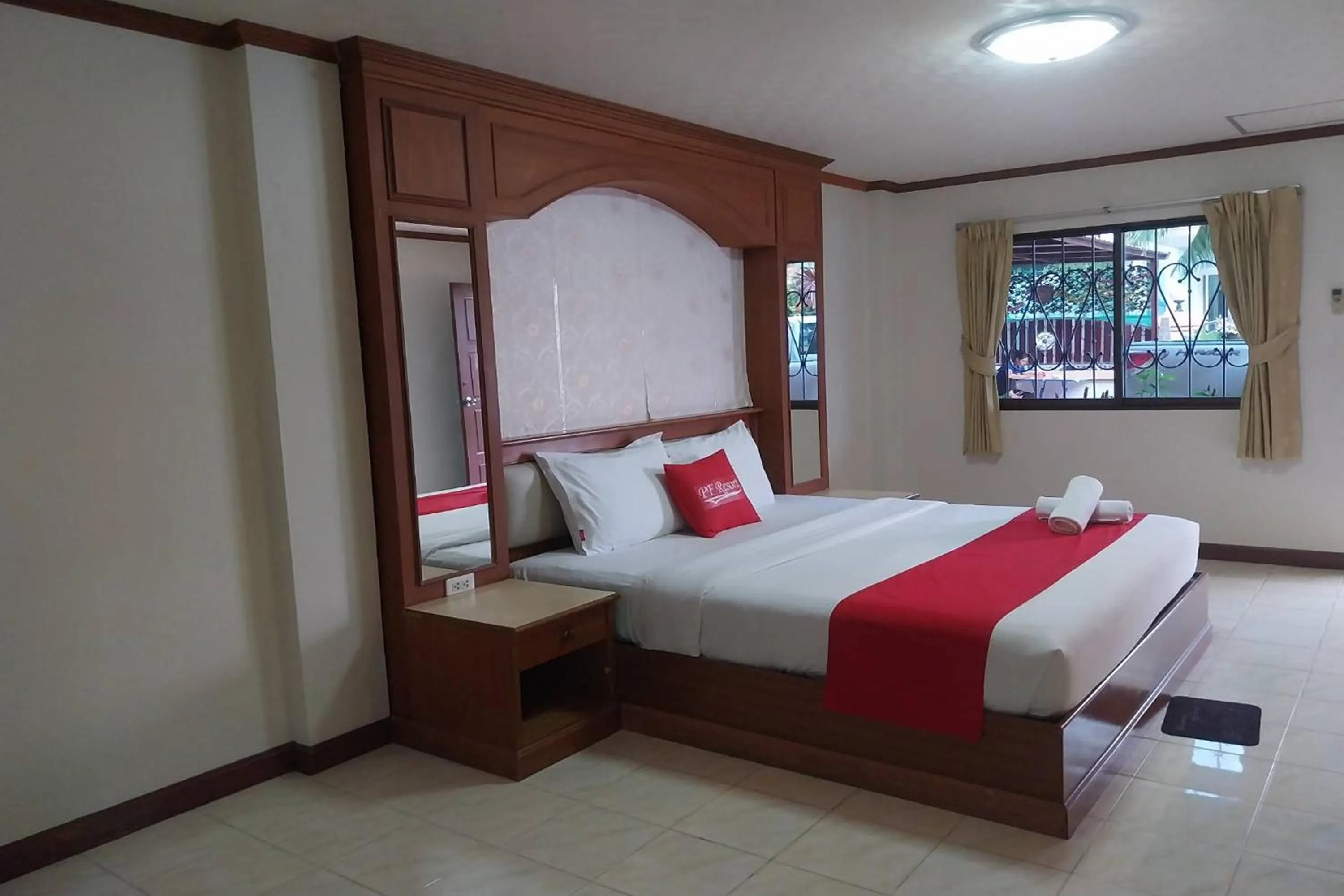 Photo of the whole room, Bed in PF Resort