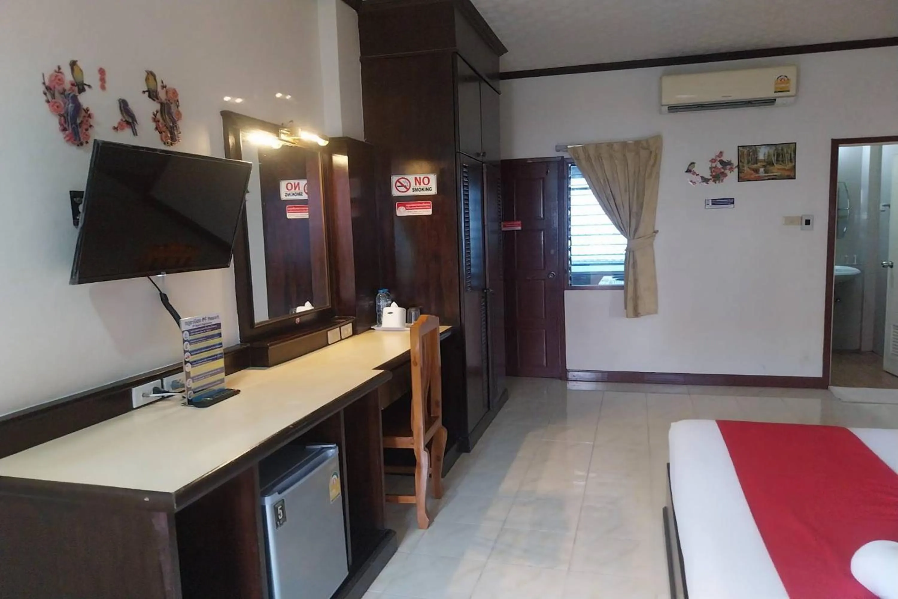 Photo of the whole room, Bed in PF Resort