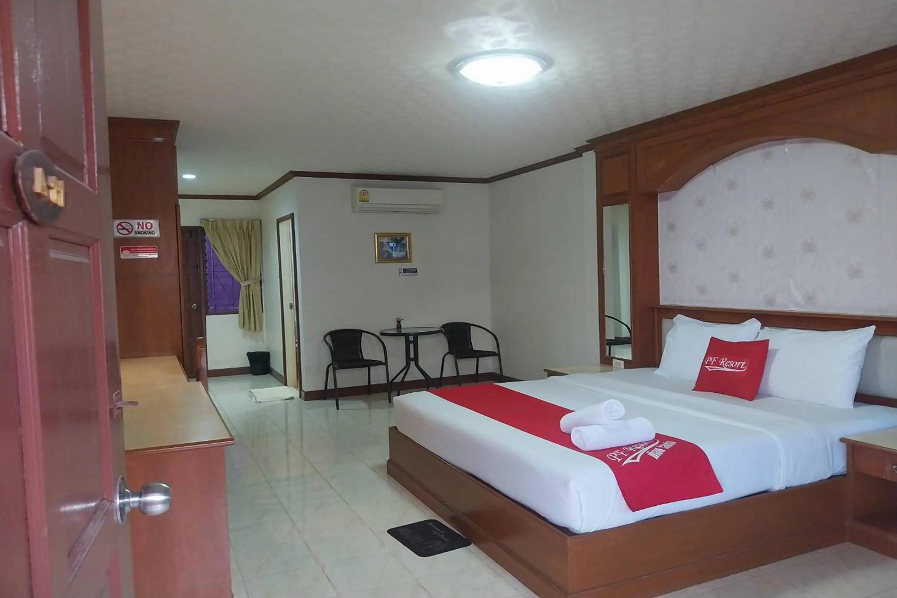 Photo of the whole room, Bed in PF Resort