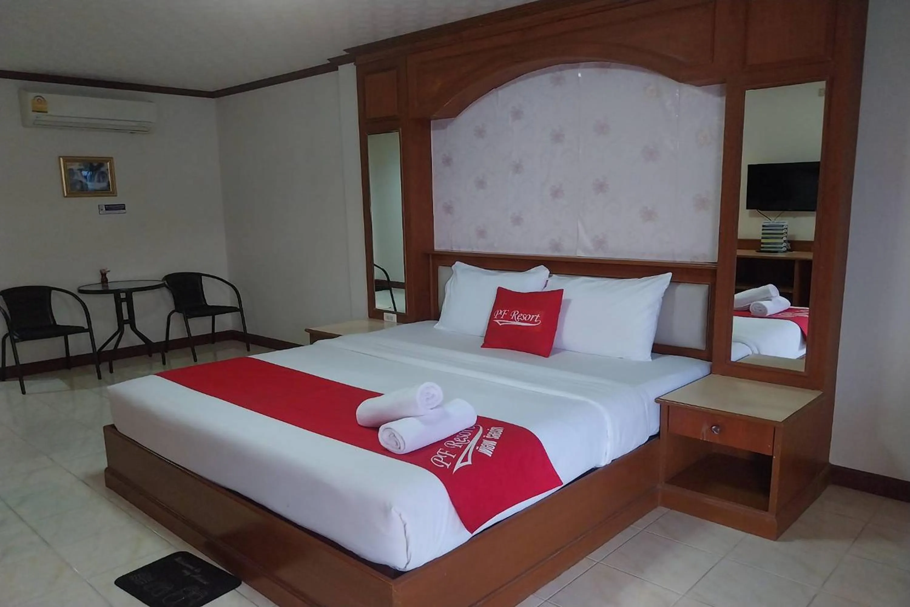 Photo of the whole room, Bed in PF Resort