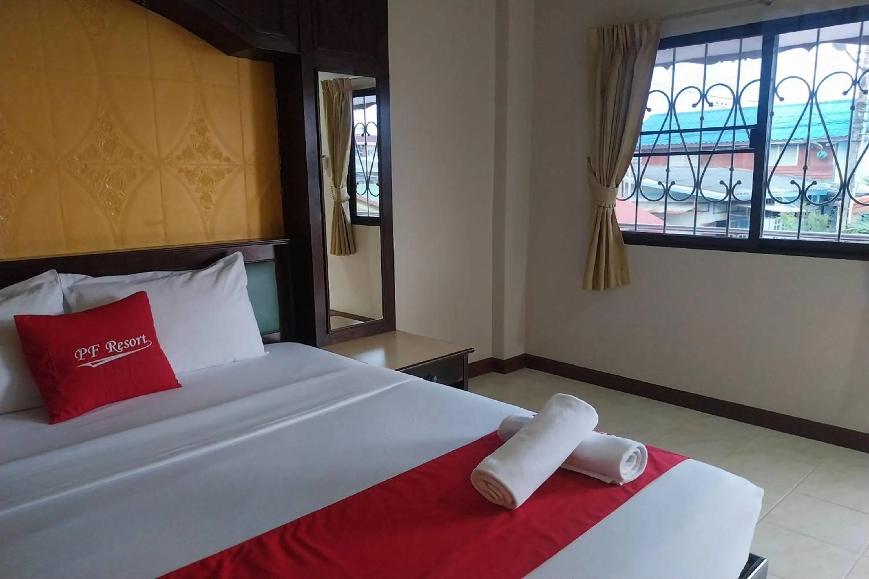 Photo of the whole room, Bed in PF Resort