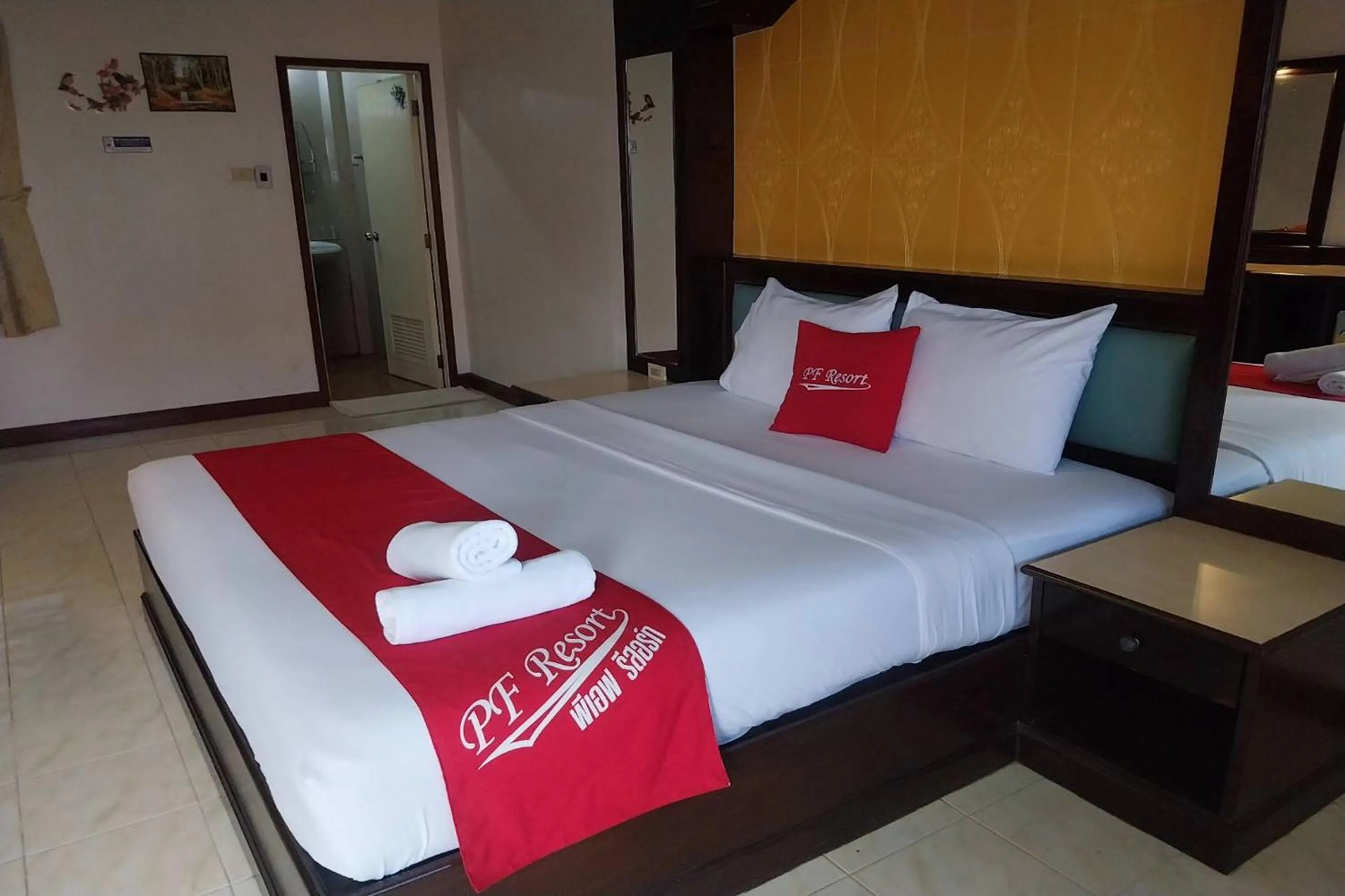 Photo of the whole room, Bed in PF Resort