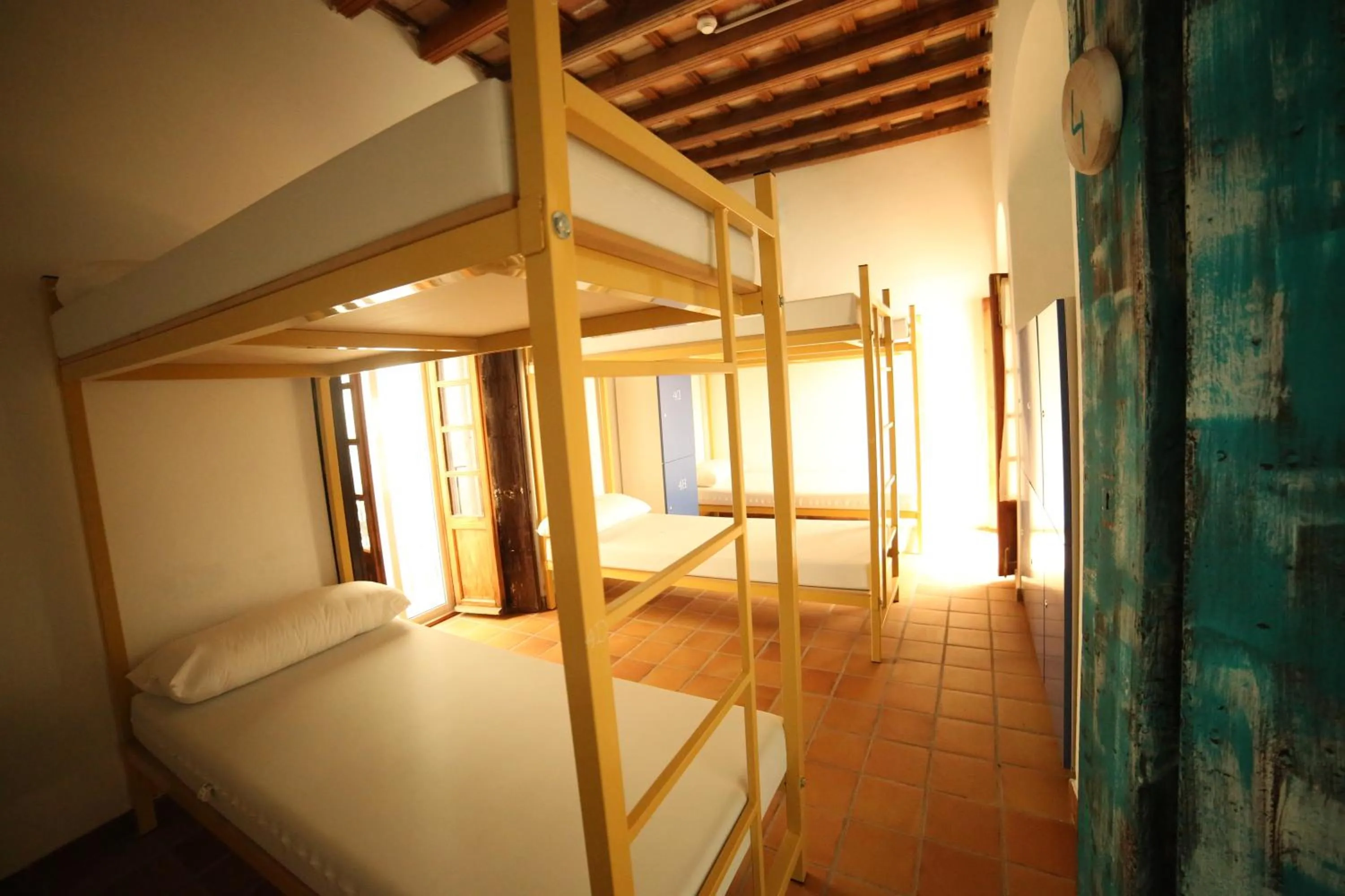 Bedroom, Bed in Wake up in Tarifa Hostel & Restaurant Lounge