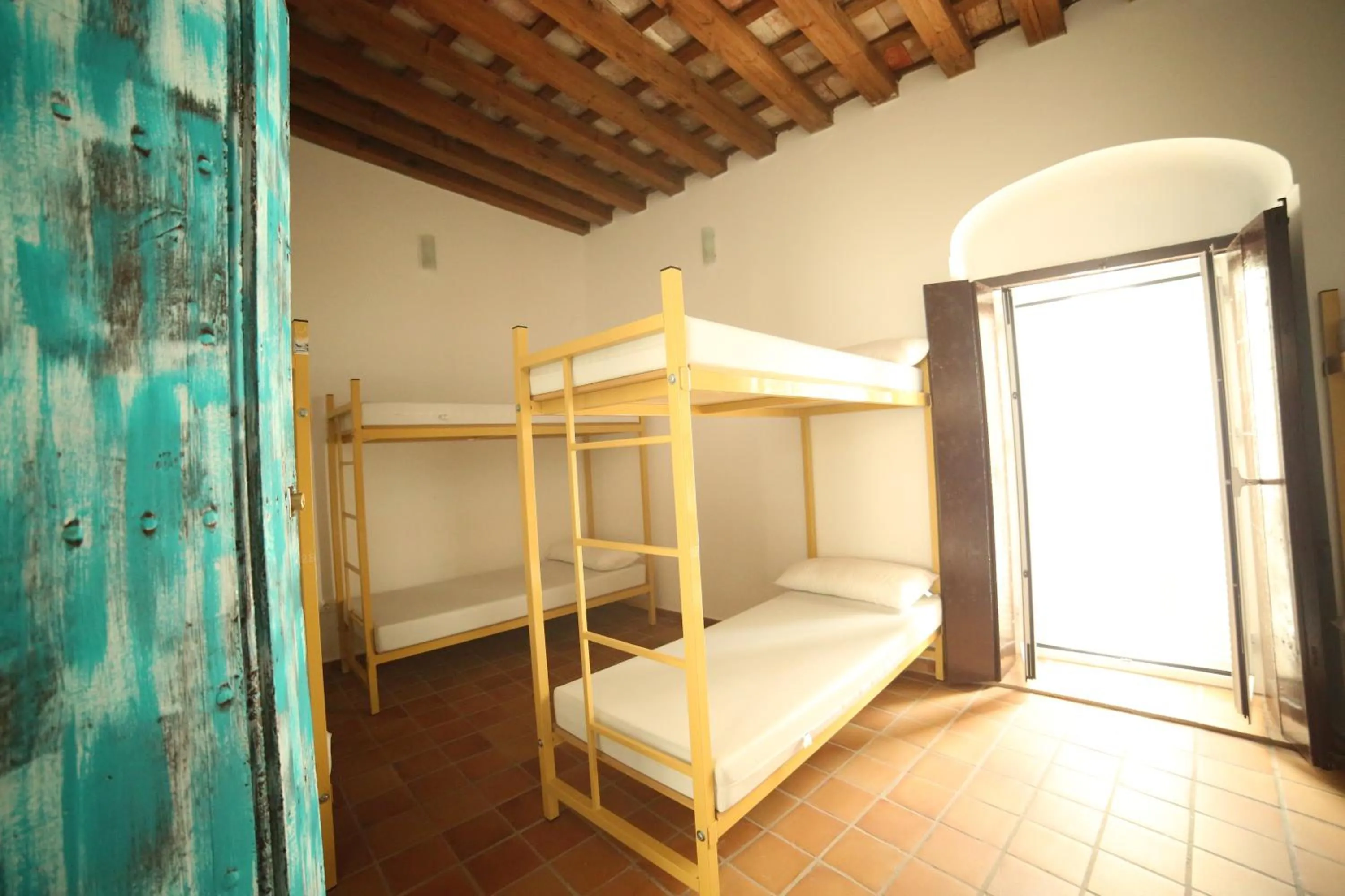 Bedroom, Bed in Wake up in Tarifa Hostel & Restaurant Lounge