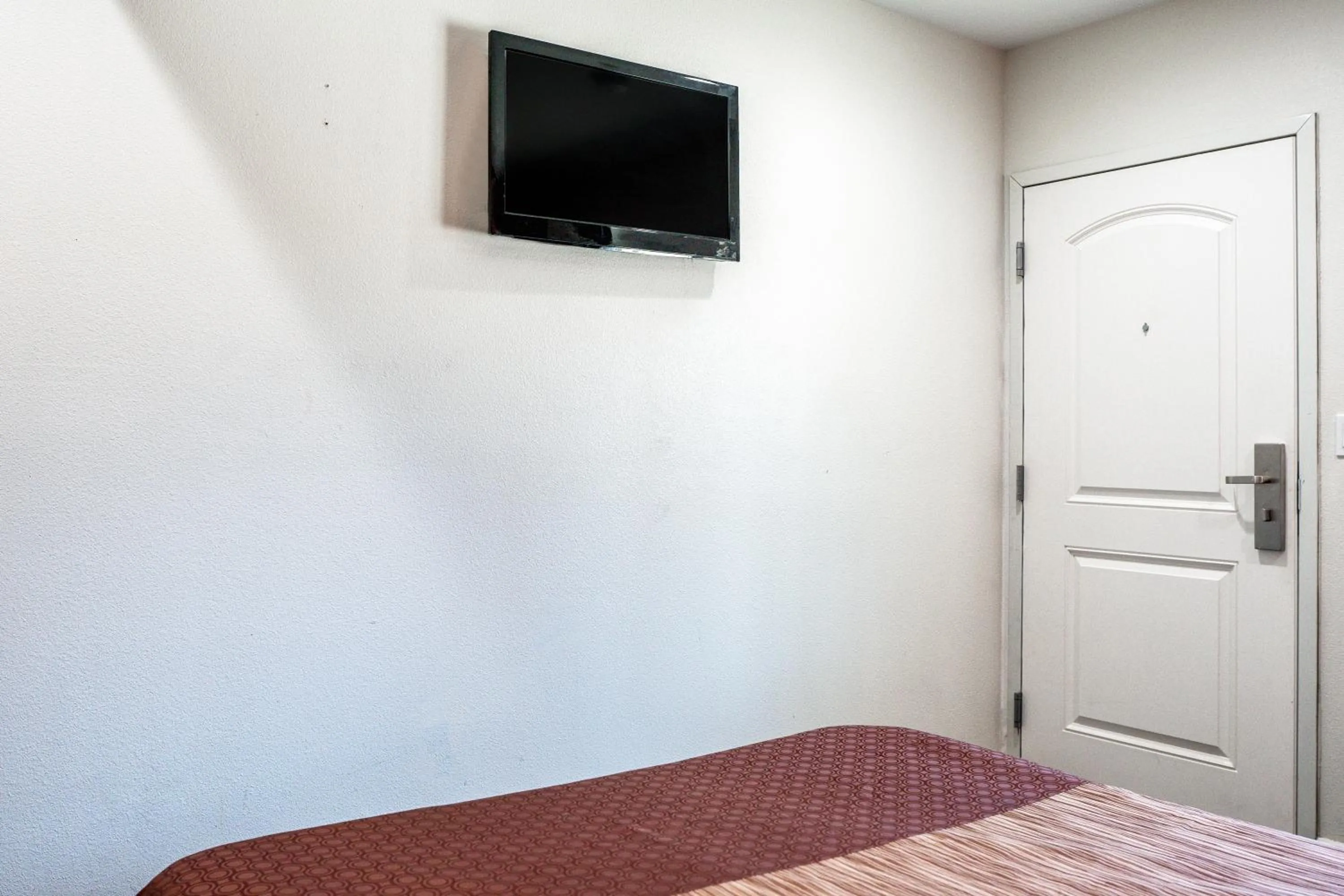 Bed in Bell Manor Motel