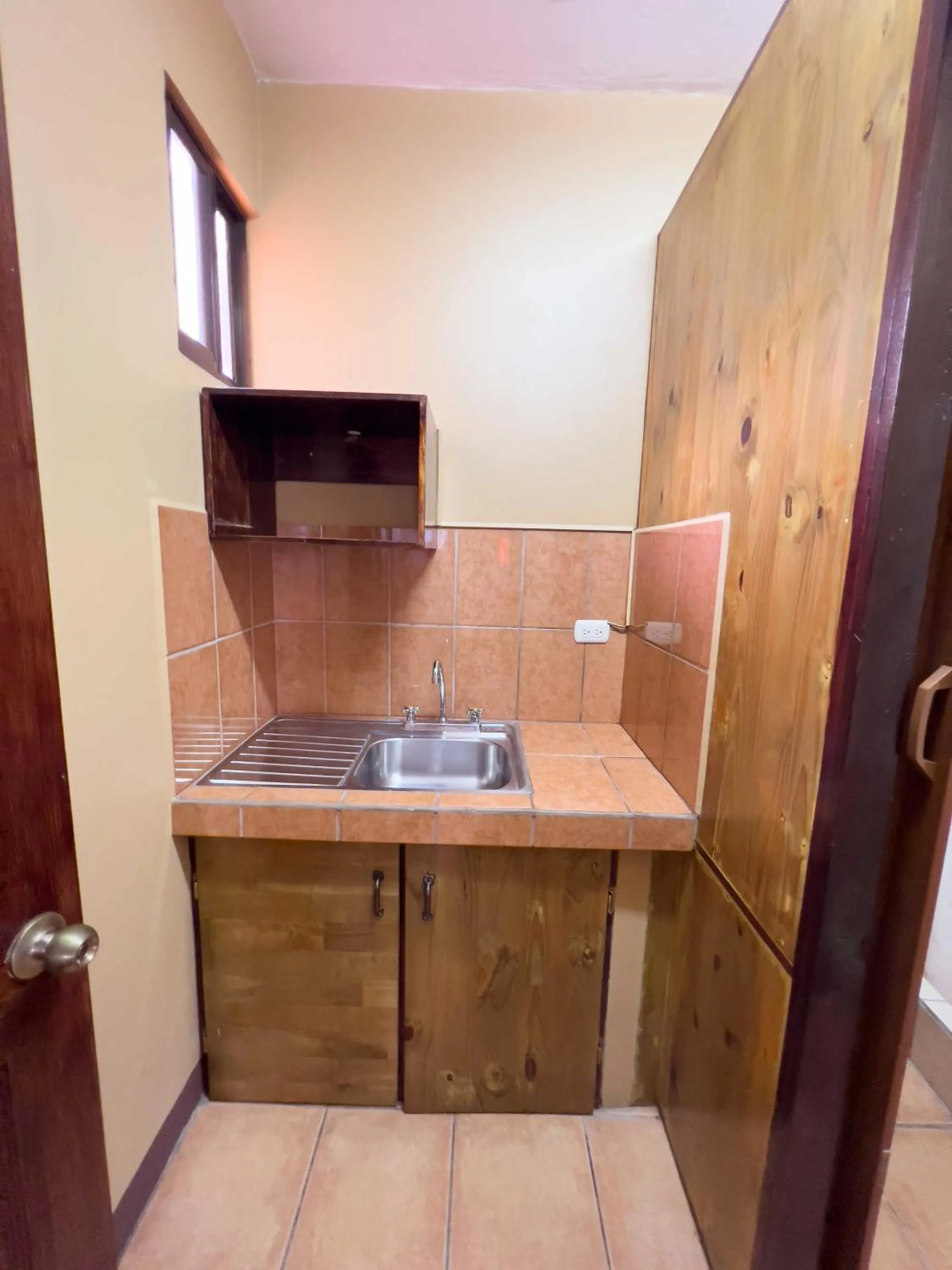 Kitchen or kitchenette in Belen Suites