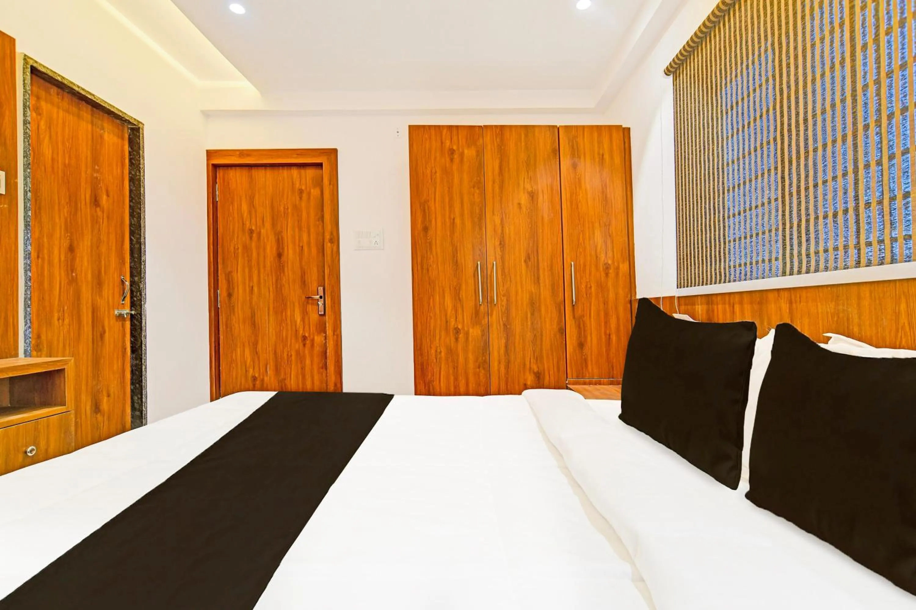 Bedroom in Hotel O Delight Stay