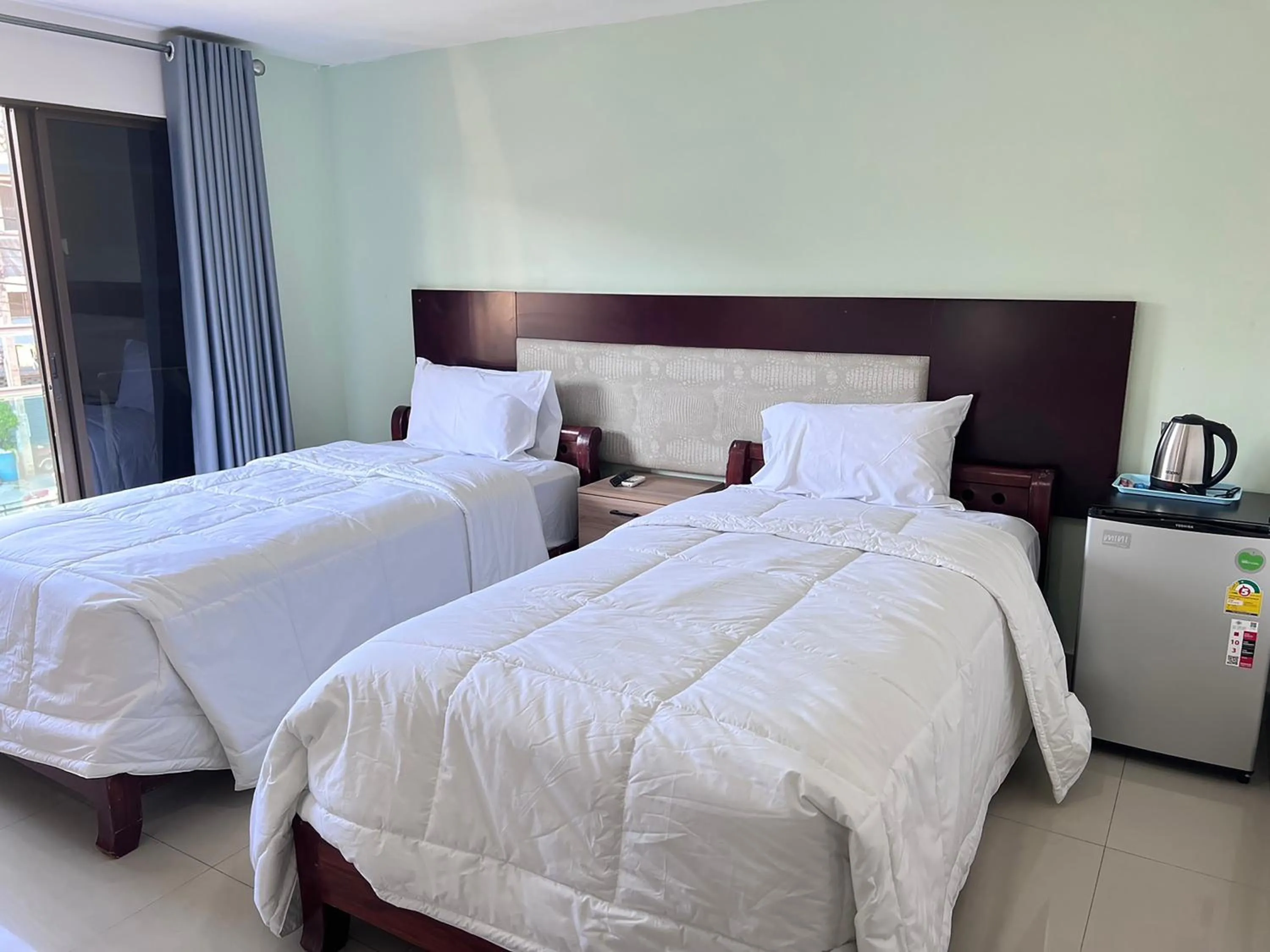 Bed in The Freelancer Hotel