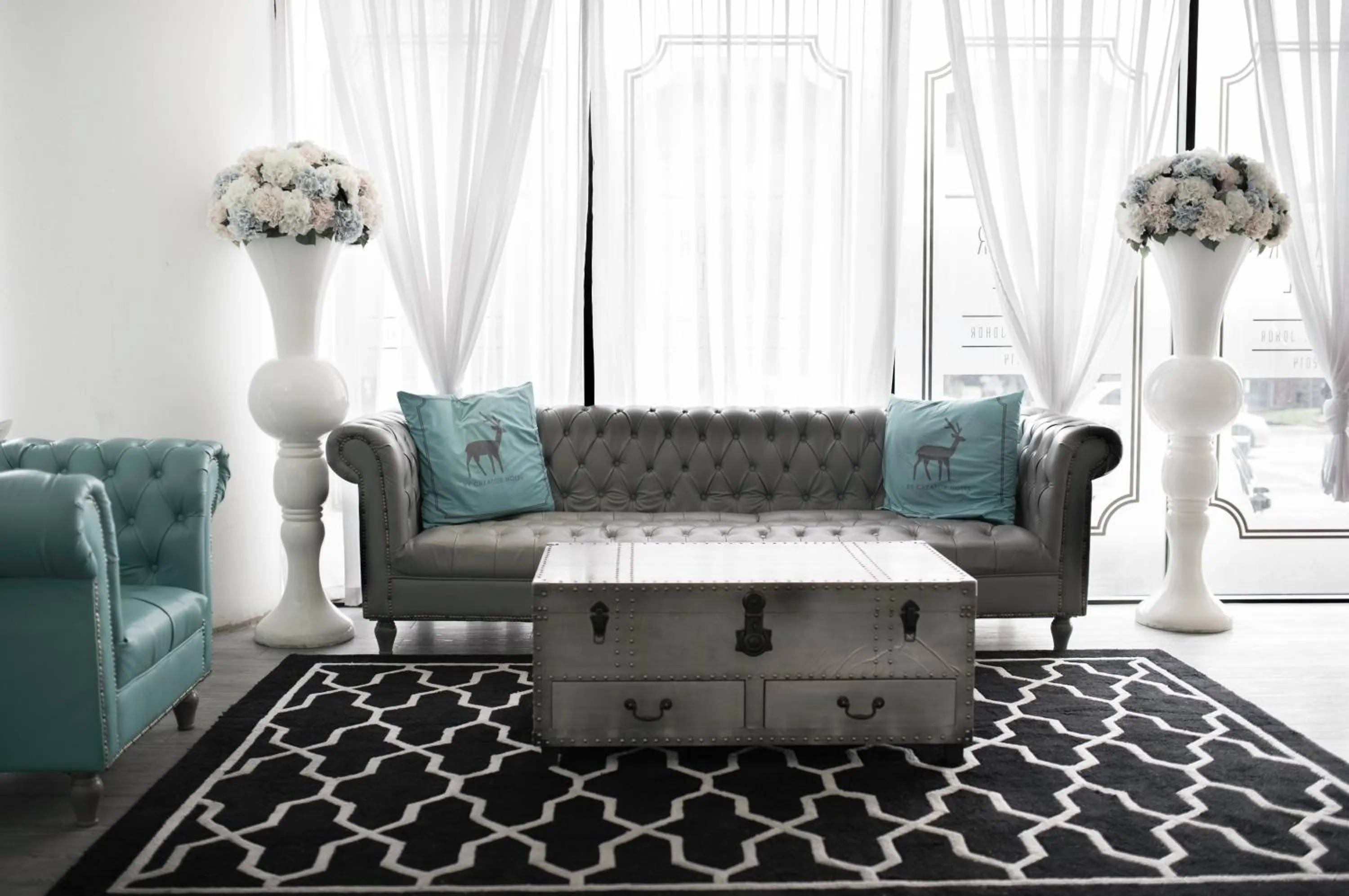 Communal lounge/ TV room in Creator Hotel