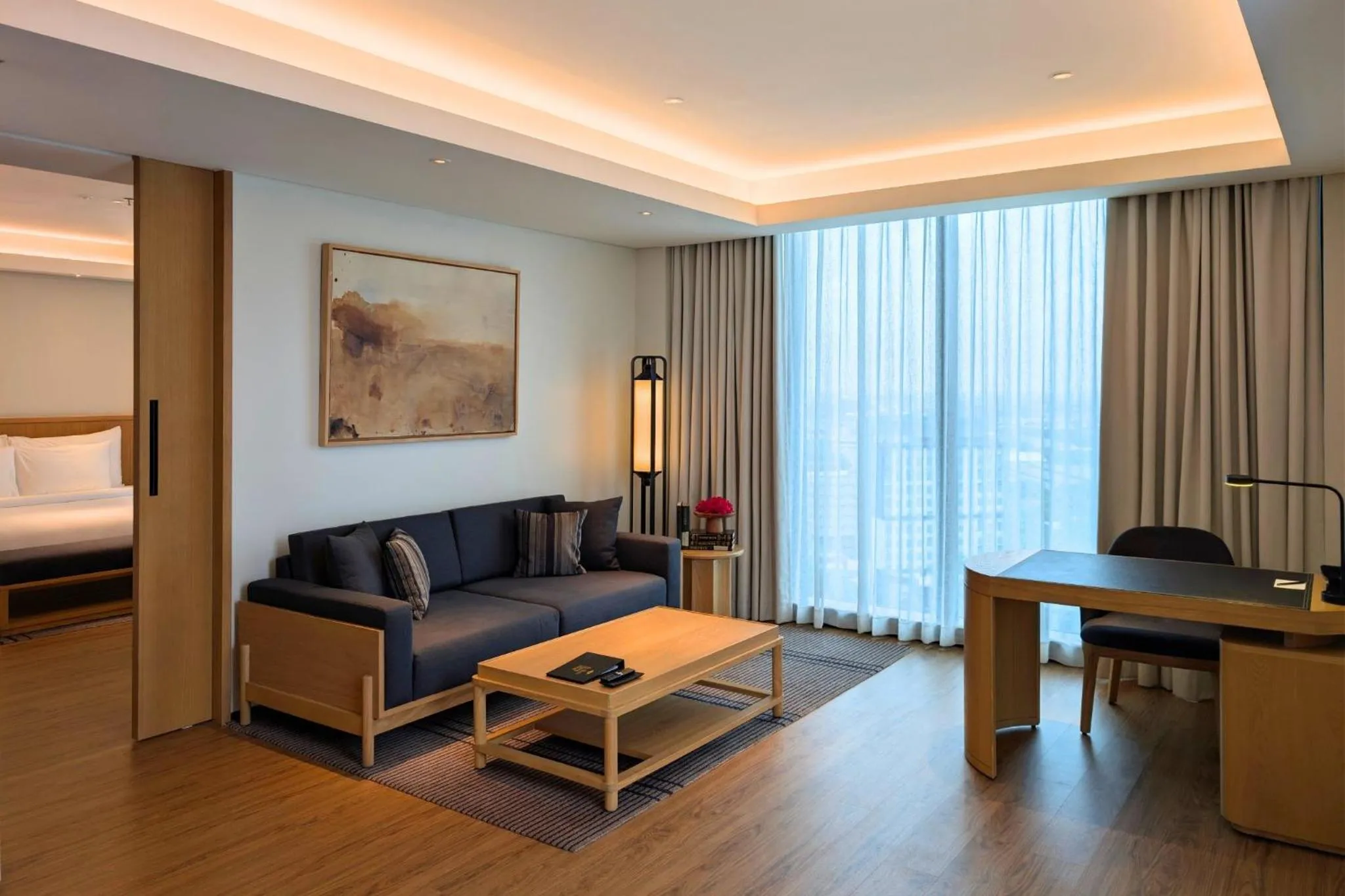 Living room, Bed in Hotel Tentrem Jakarta