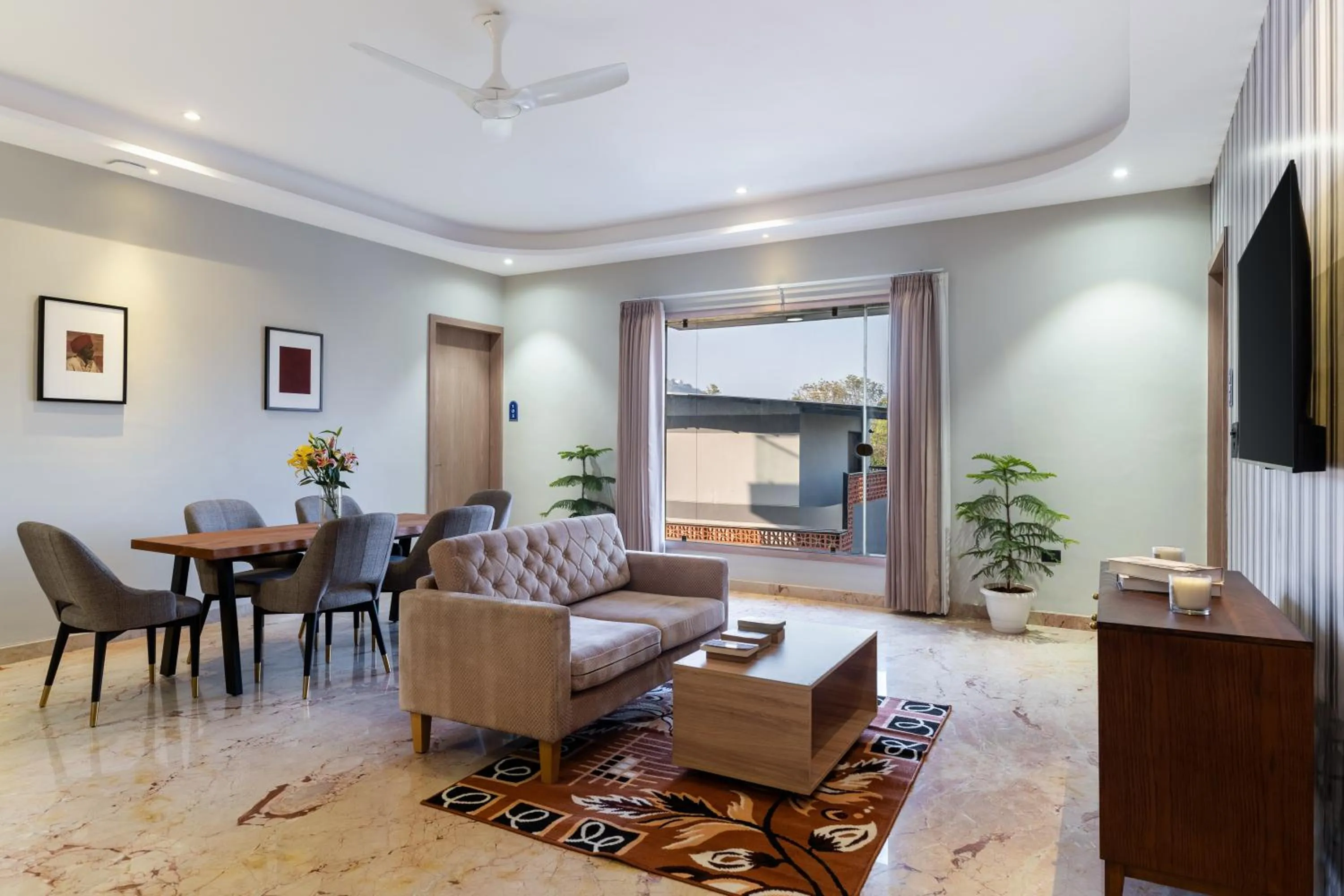 Communal lounge/ TV room in My Downtown - Hotel Blue Chip Udaipur