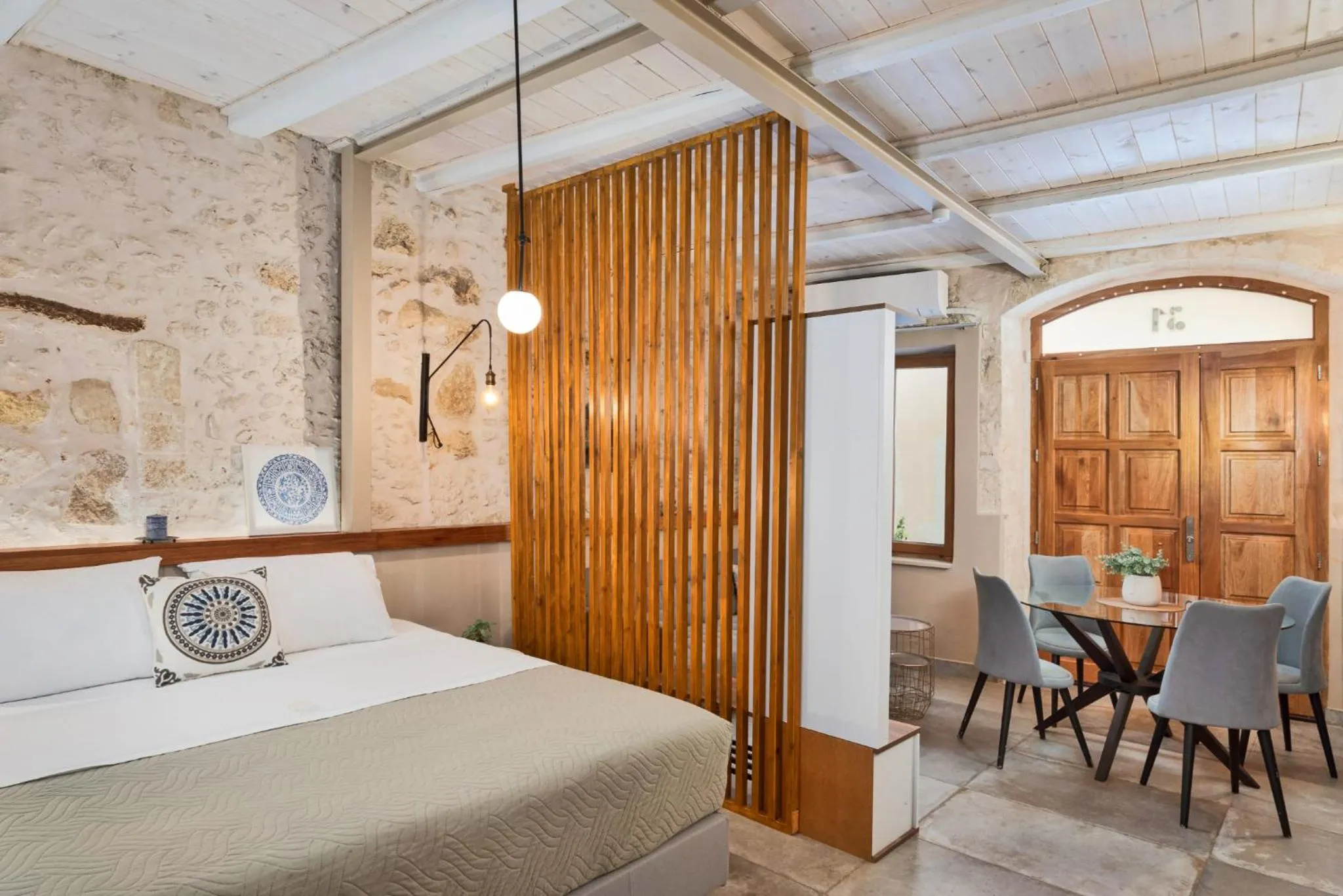 Bed in Mansio Boutique Hotel