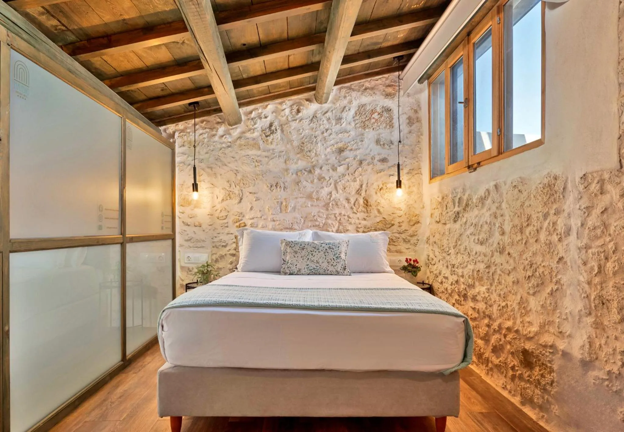 Bed in Mansio Boutique Hotel