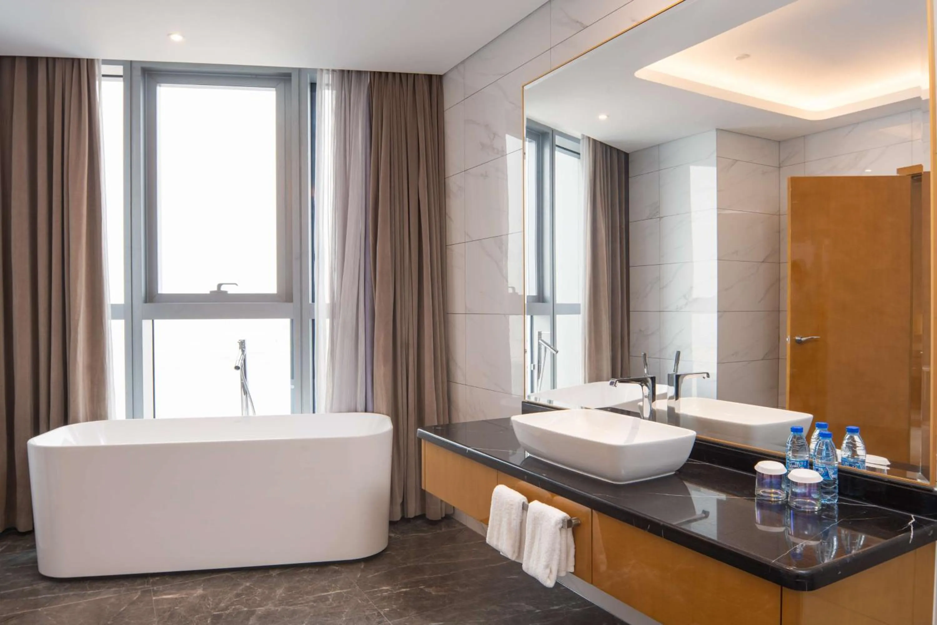 Bathroom in Hilton Brazzaville Les Tours Jumelles Hotel & Residences
