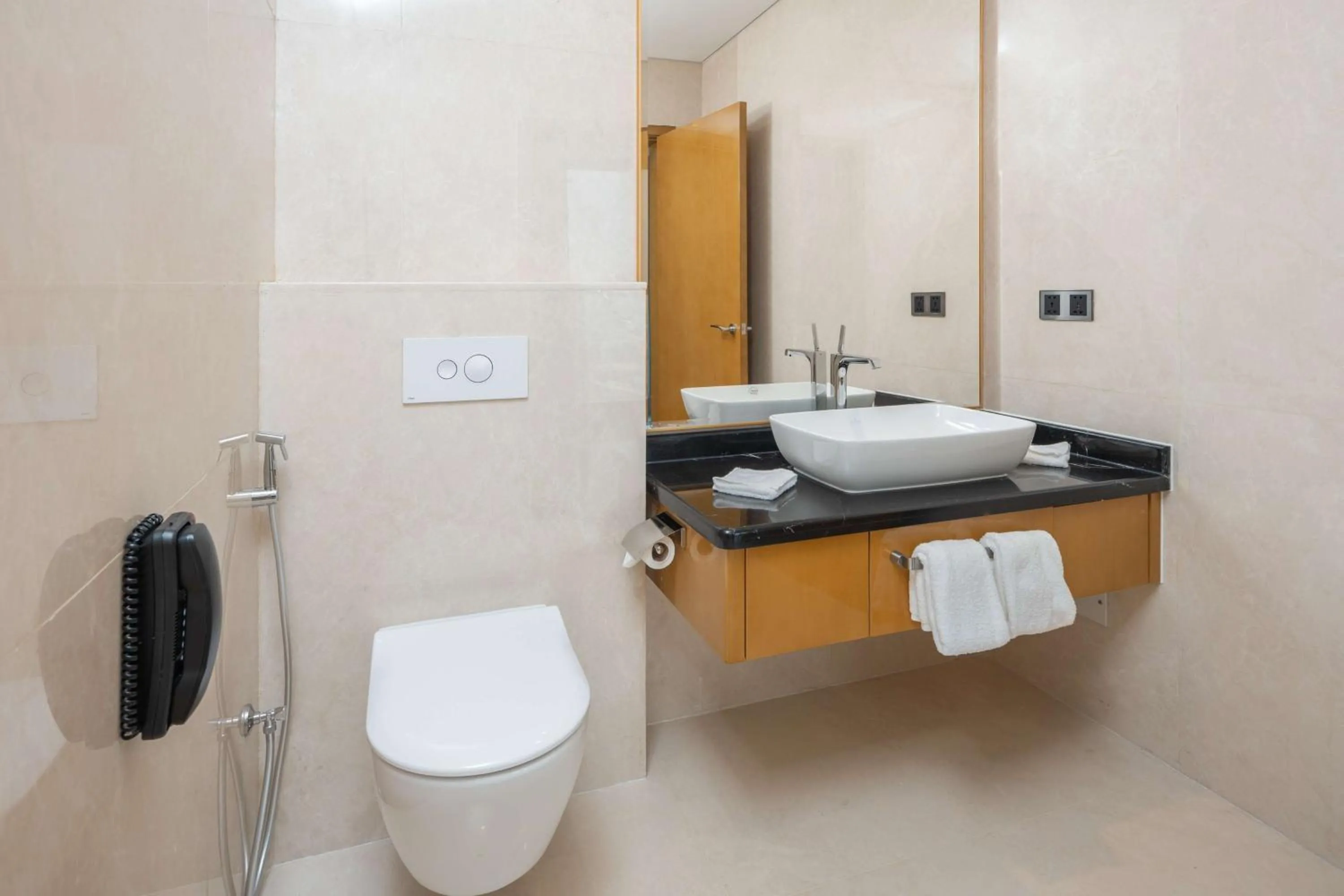 Bathroom in Hilton Brazzaville Les Tours Jumelles Hotel & Residences