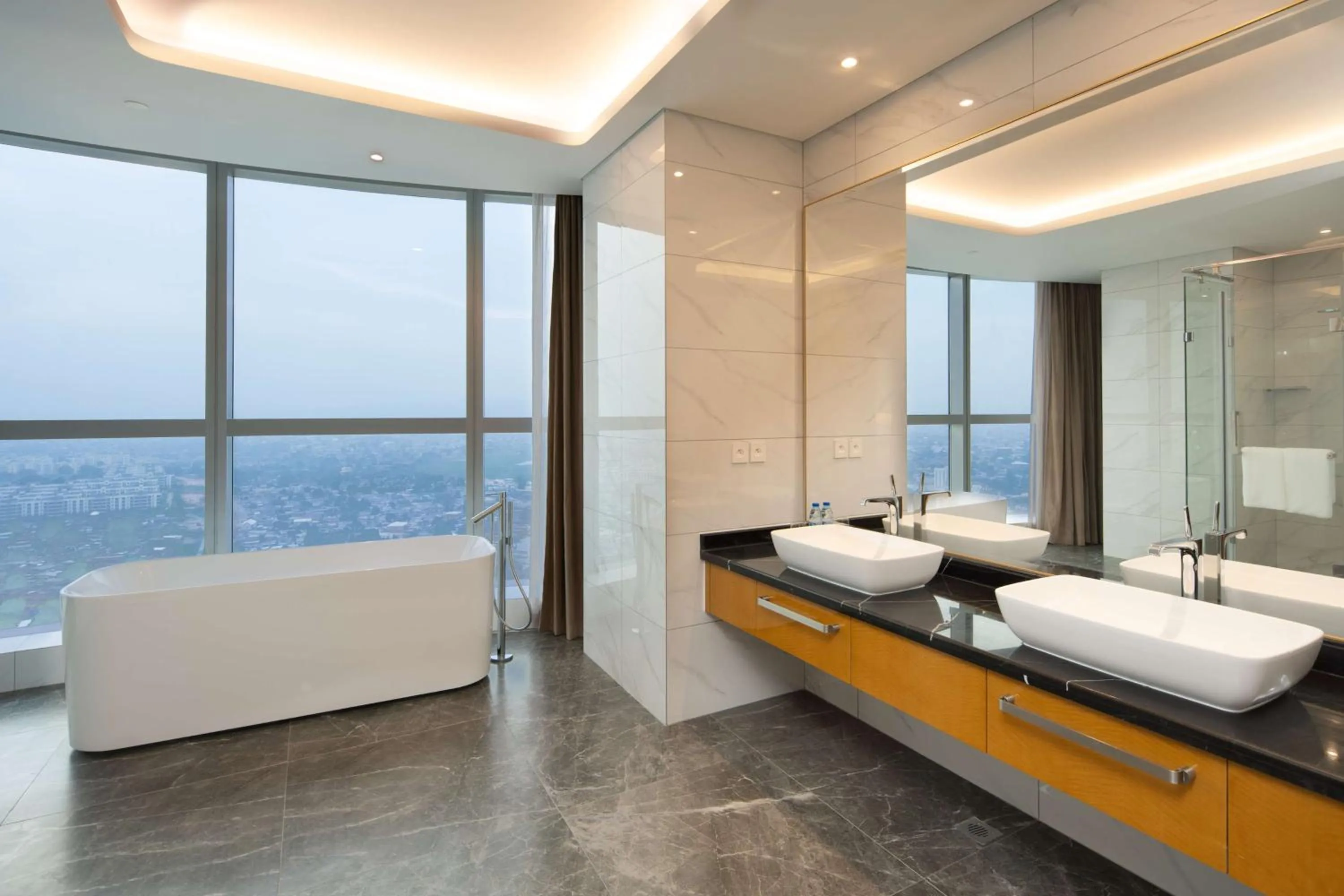 Bathroom in Hilton Brazzaville Les Tours Jumelles Hotel & Residences