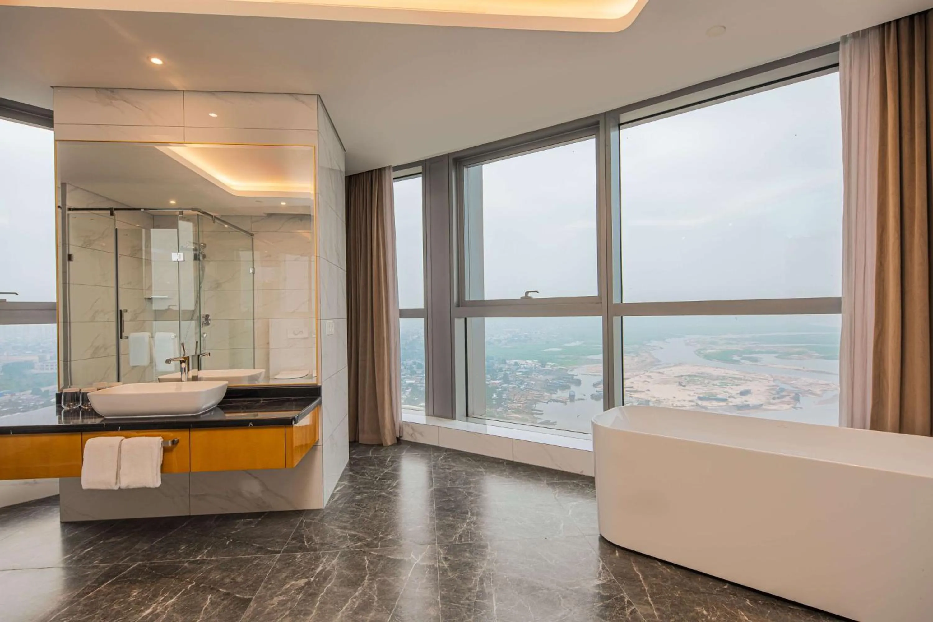 Bathroom in Hilton Brazzaville Les Tours Jumelles Hotel & Residences
