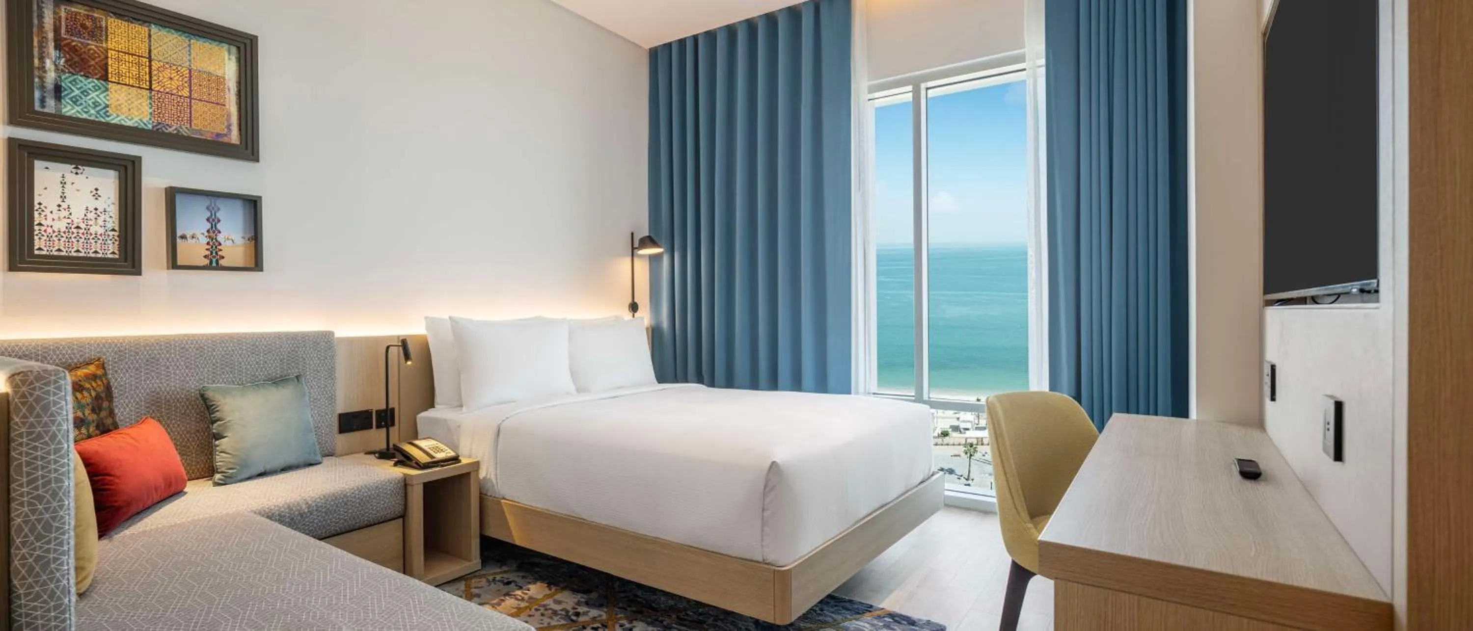 Living room, Bed in Hampton By Hilton Kuwait Salmiya