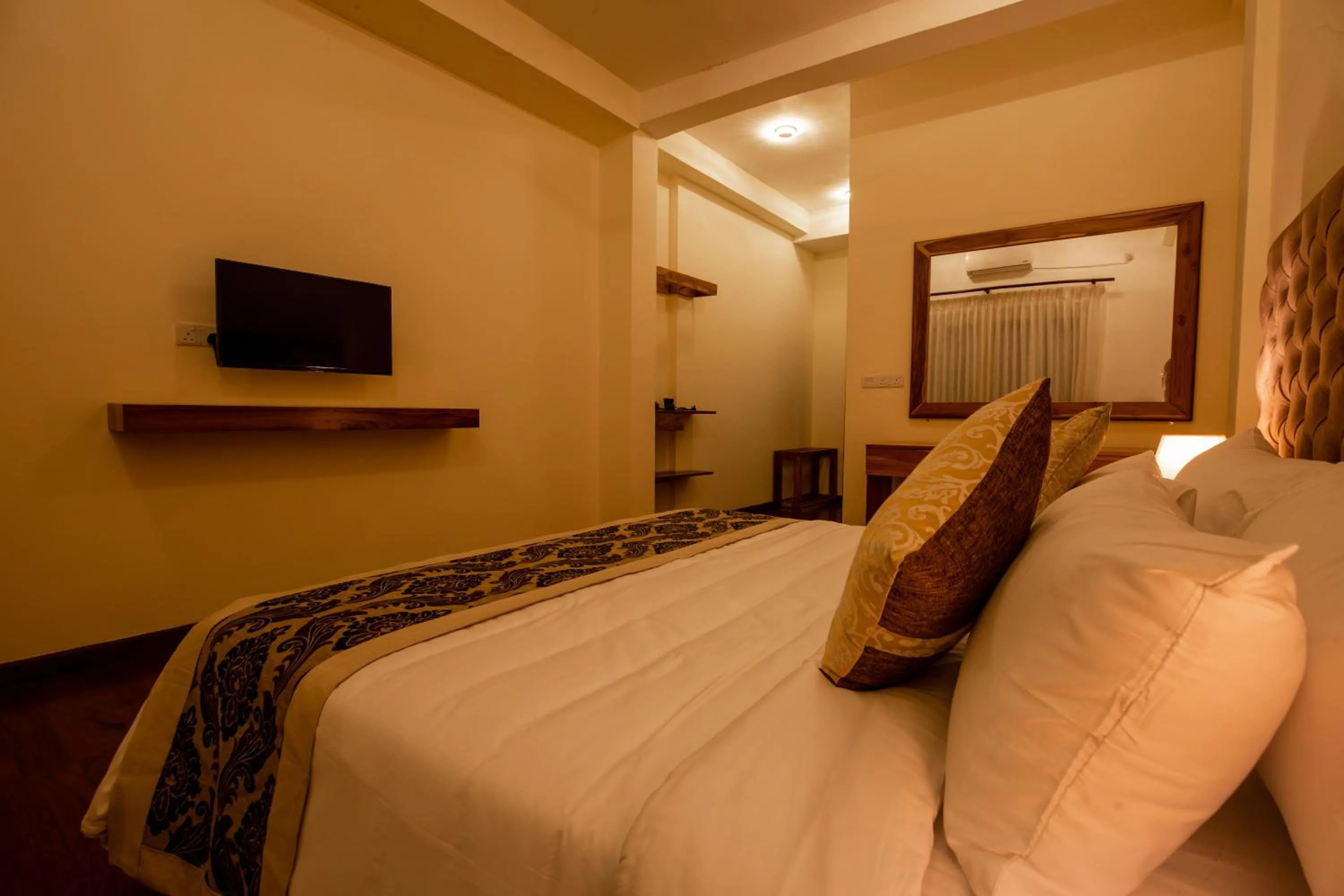 Living room, Bed in Manthra Leisure