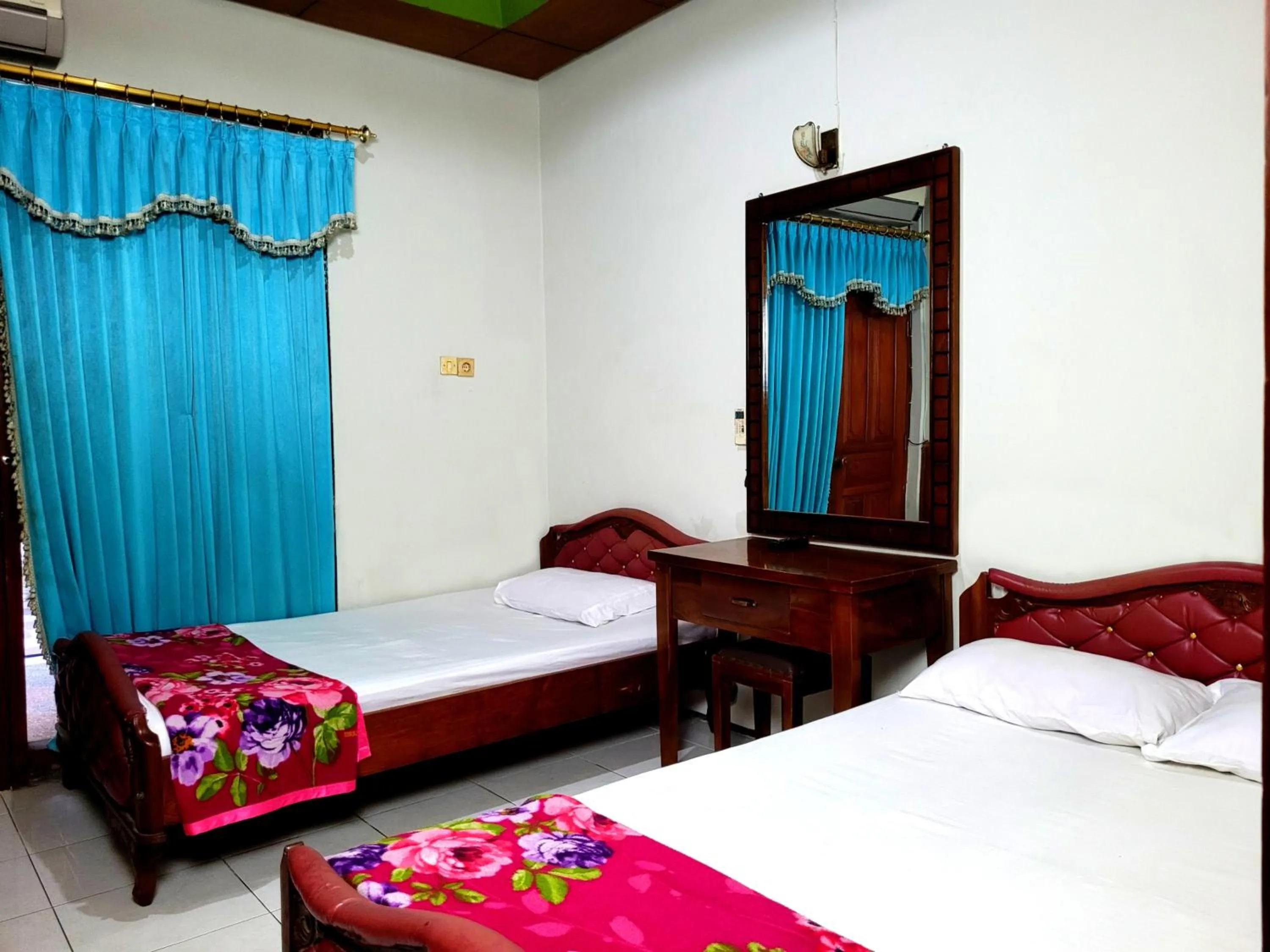 Bed in Hotel Dirgahayu Ponorogo