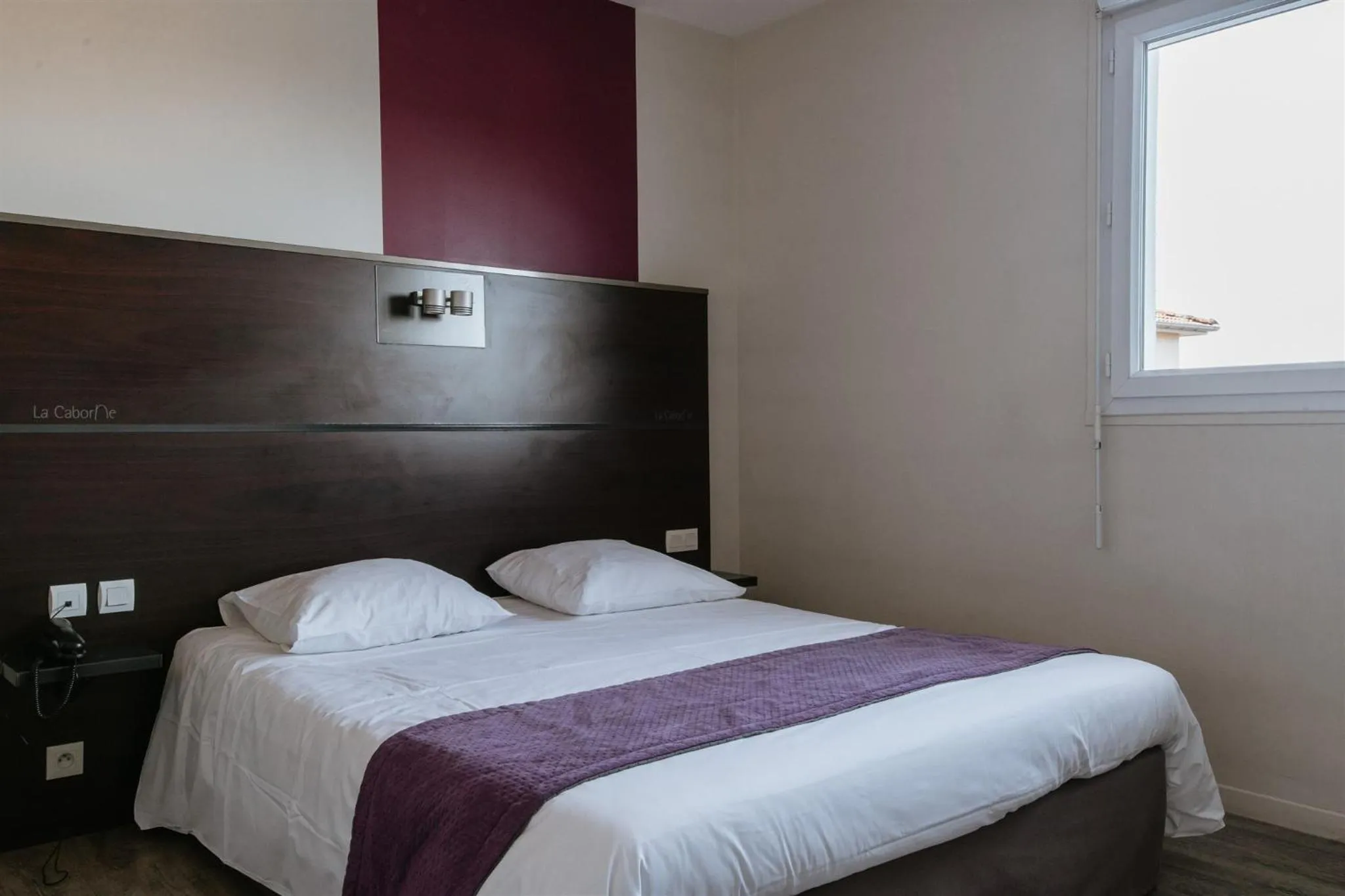 Bed in Hotel-Restaurant La Caborne