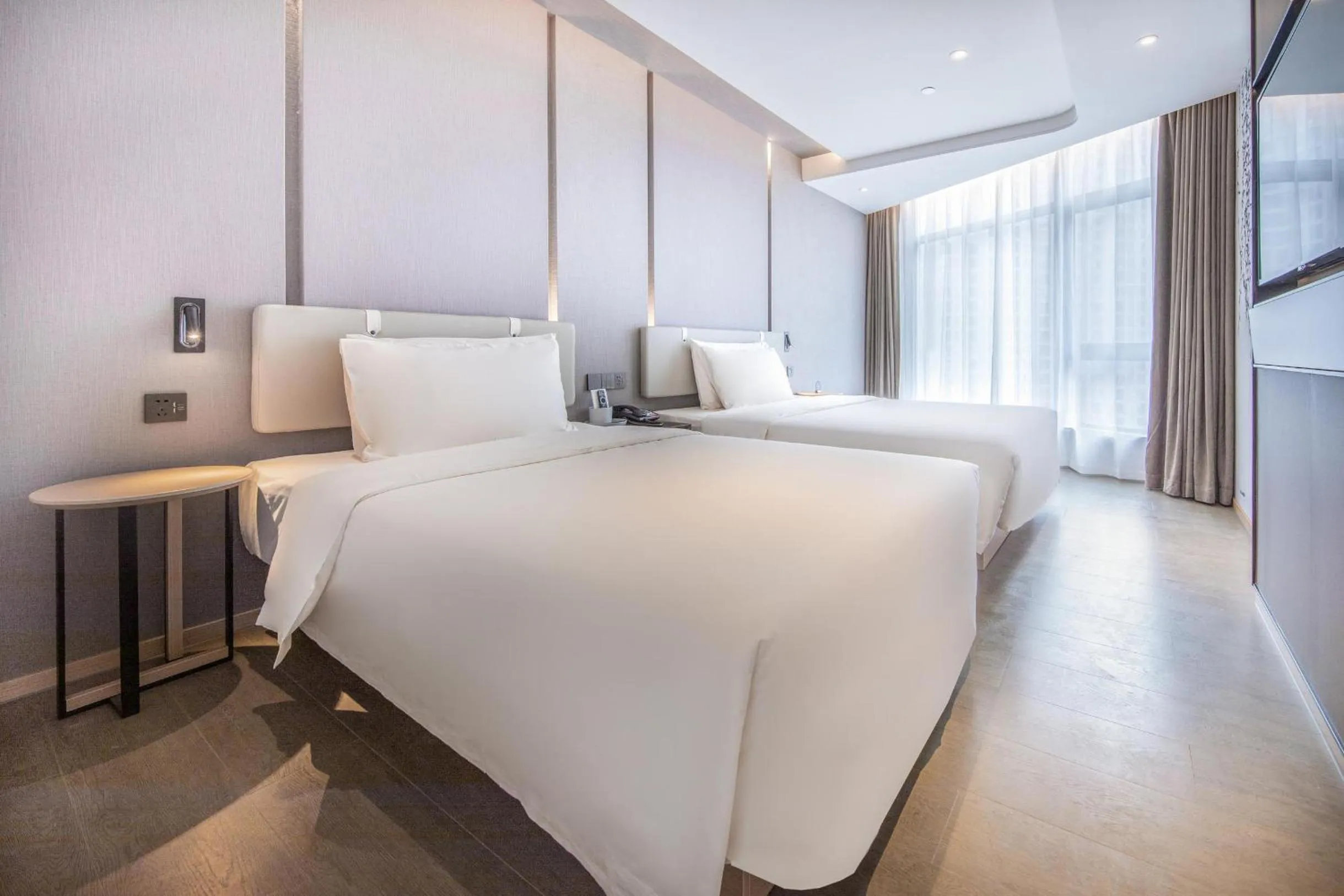 Bed in Atour Hotel Ningbo Yinzhou Wanda Mingzhouli