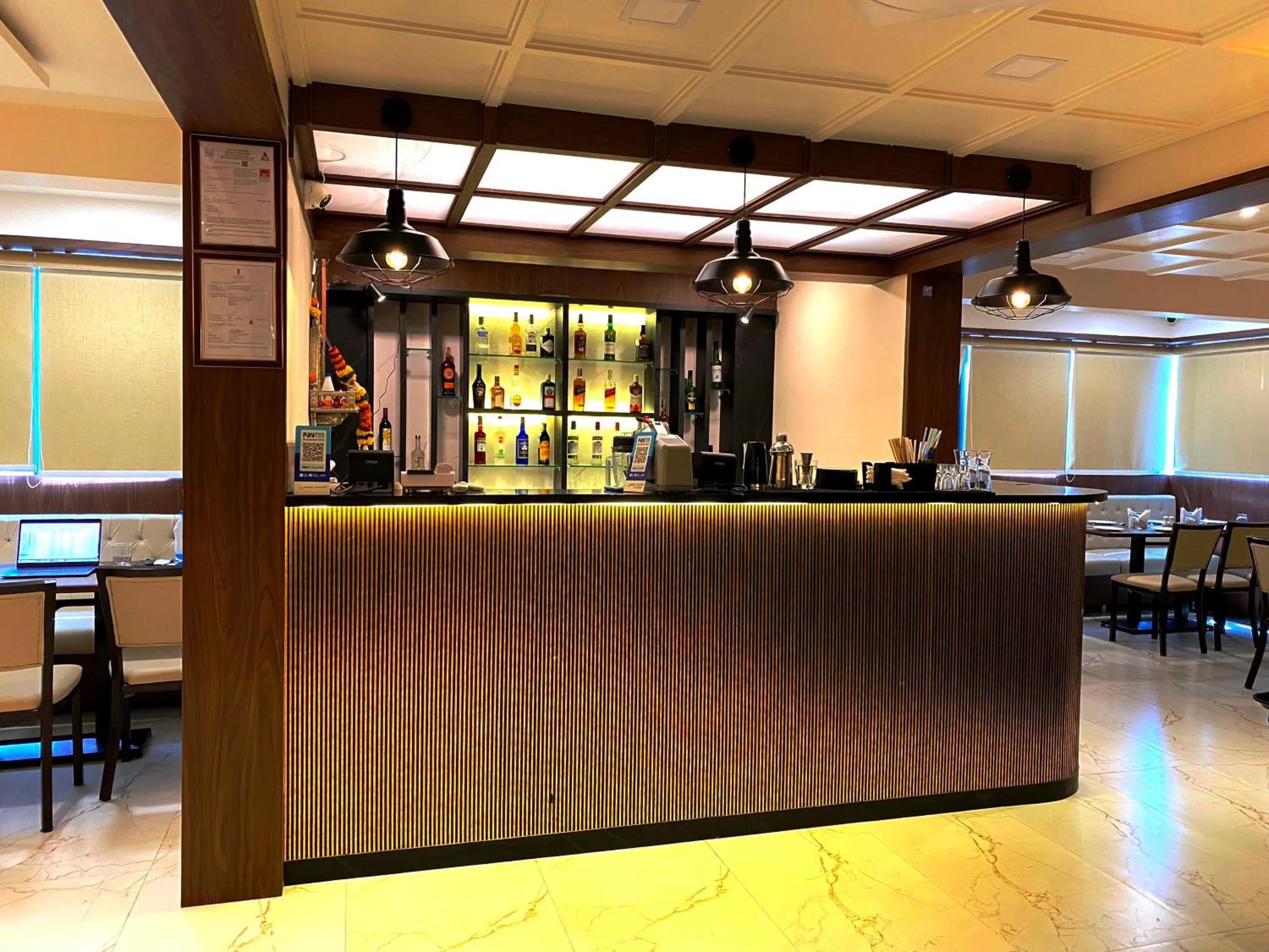 Lounge or bar in The Grand Sarovar Inn And Suites
