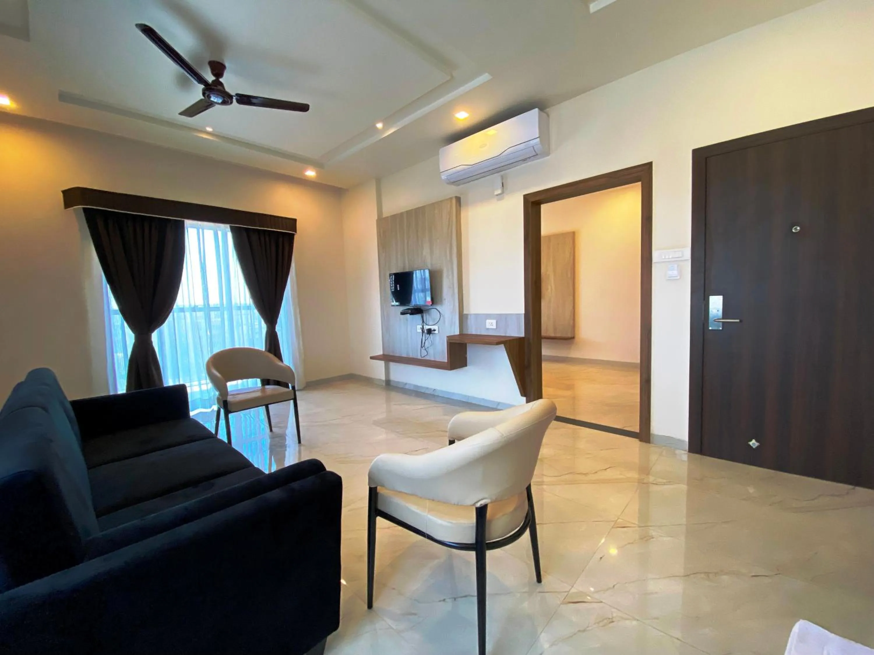 Seating area in The Grand Sarovar Inn And Suites