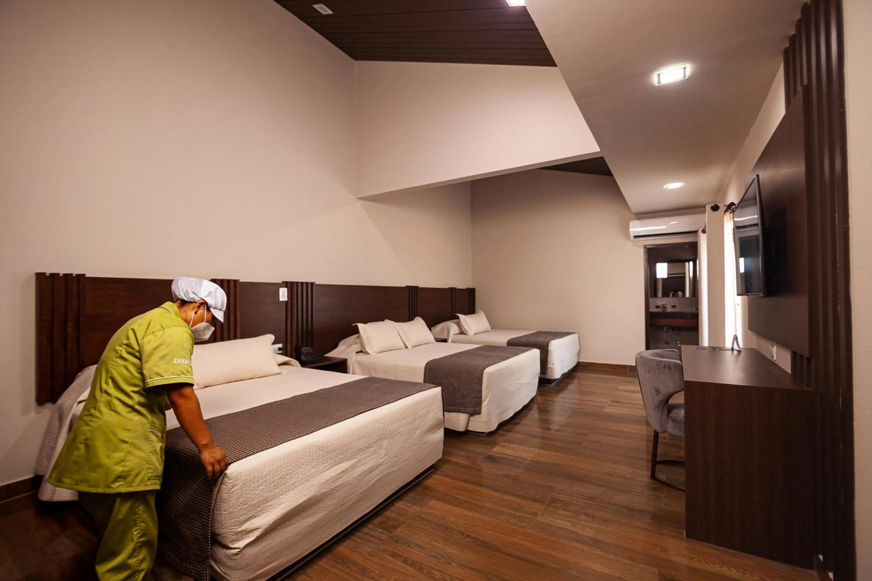 Photo of the whole room, Bed in Hotel Sirari By Regina