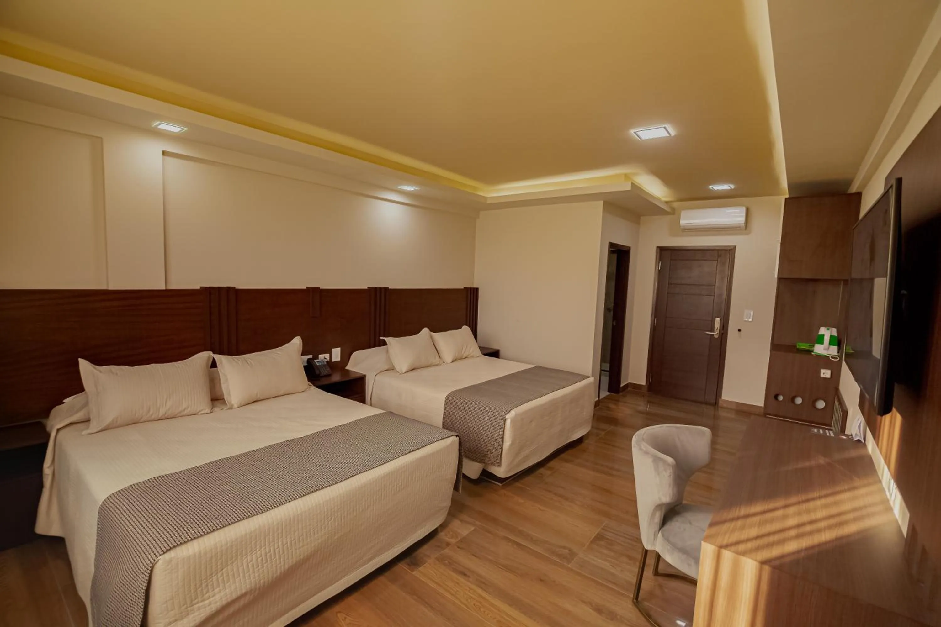 Photo of the whole room, Bed in Hotel Sirari By Regina